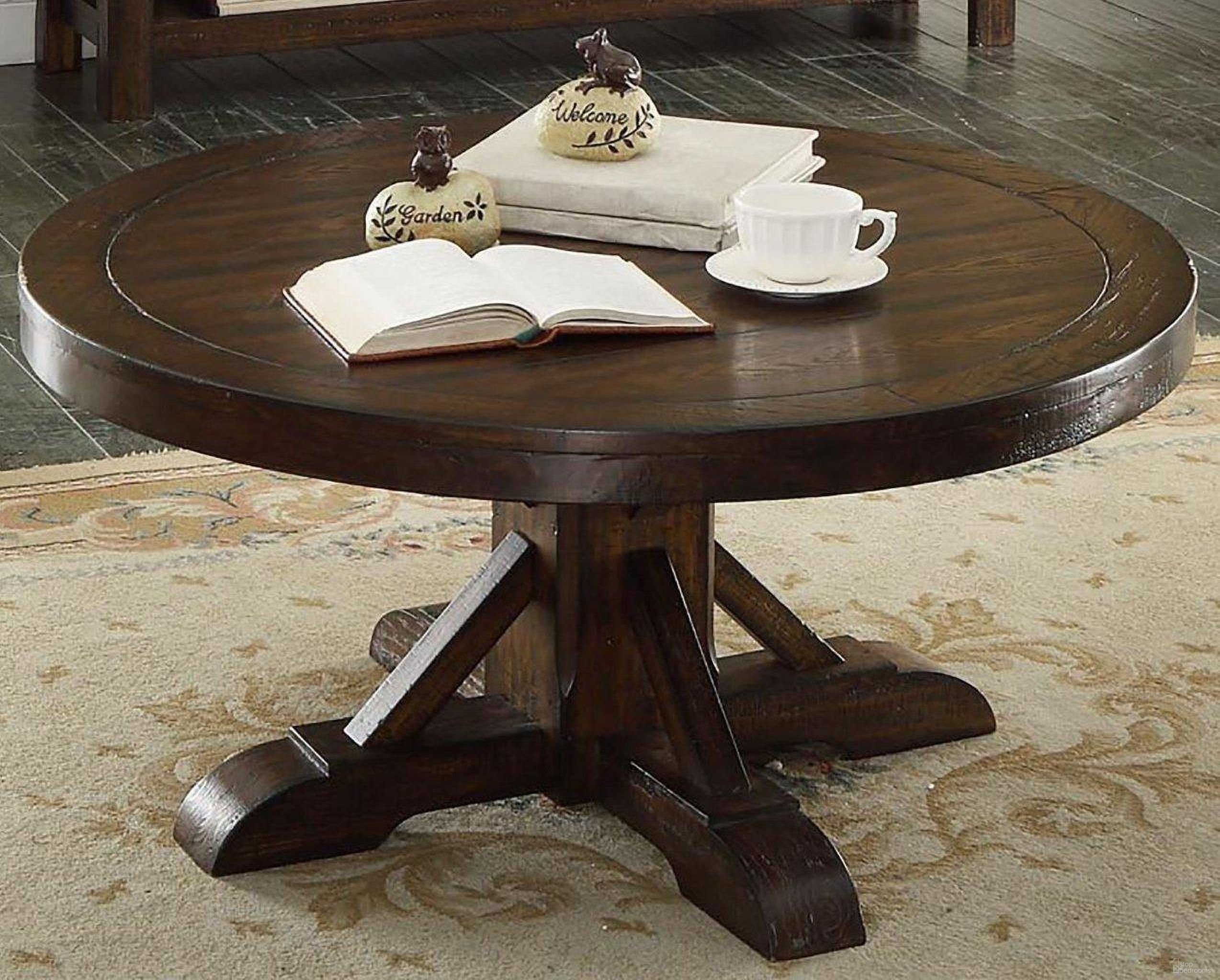 The appearance of Gettysburg Heavy Distressed Dark Round Cocktail Table designed by ECI in the transitional interior design. This brown piece of furniture  was selected by 1StopBedrooms from Gettysburg Collection to add a touch of cosiness and style into your home. Sku: 1475-05-RCKT-T/B.