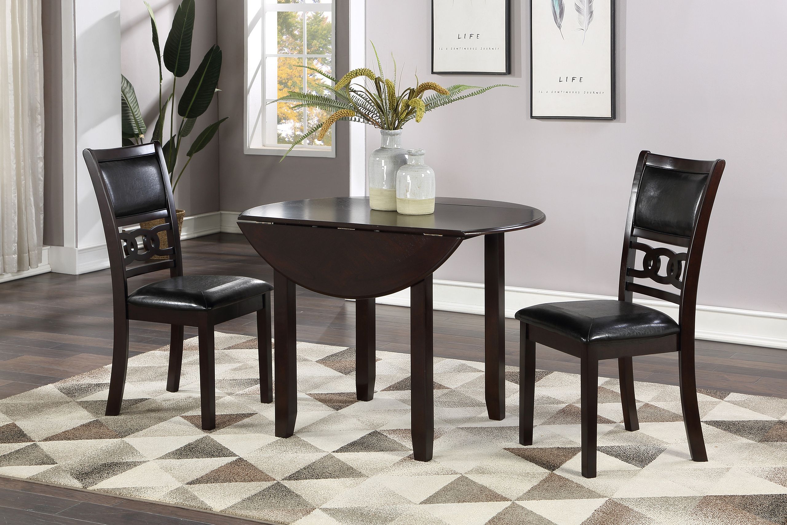 The appearance of Gia 3 Piece 42 Inch Drop Leaf Dining Table and 2 Chairs In Ebony designed by New Classic in the transitional interior design. This ebony piece of furniture  was selected by 1StopBedrooms from Gia Collection to add a touch of cosiness and style into your home. Sku: D1701-40S-EBY. Material: Wood.
