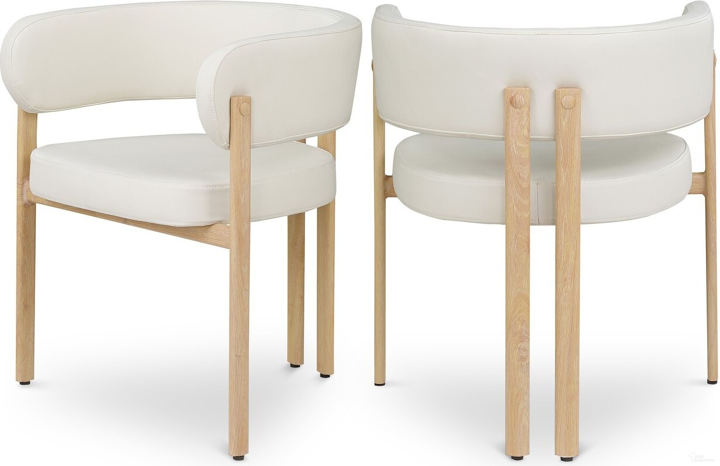 The appearance of Gideon Vegan Leather Dining Chair Set of 2 In Cream and Natural designed by Meridian in the modern / contemporary interior design. This cream piece of furniture  was selected by 1StopBedrooms from Gideon Collection to add a touch of cosiness and style into your home. Sku: 982Cream-C. Material: Iron. Chair Type: Arm Chair.