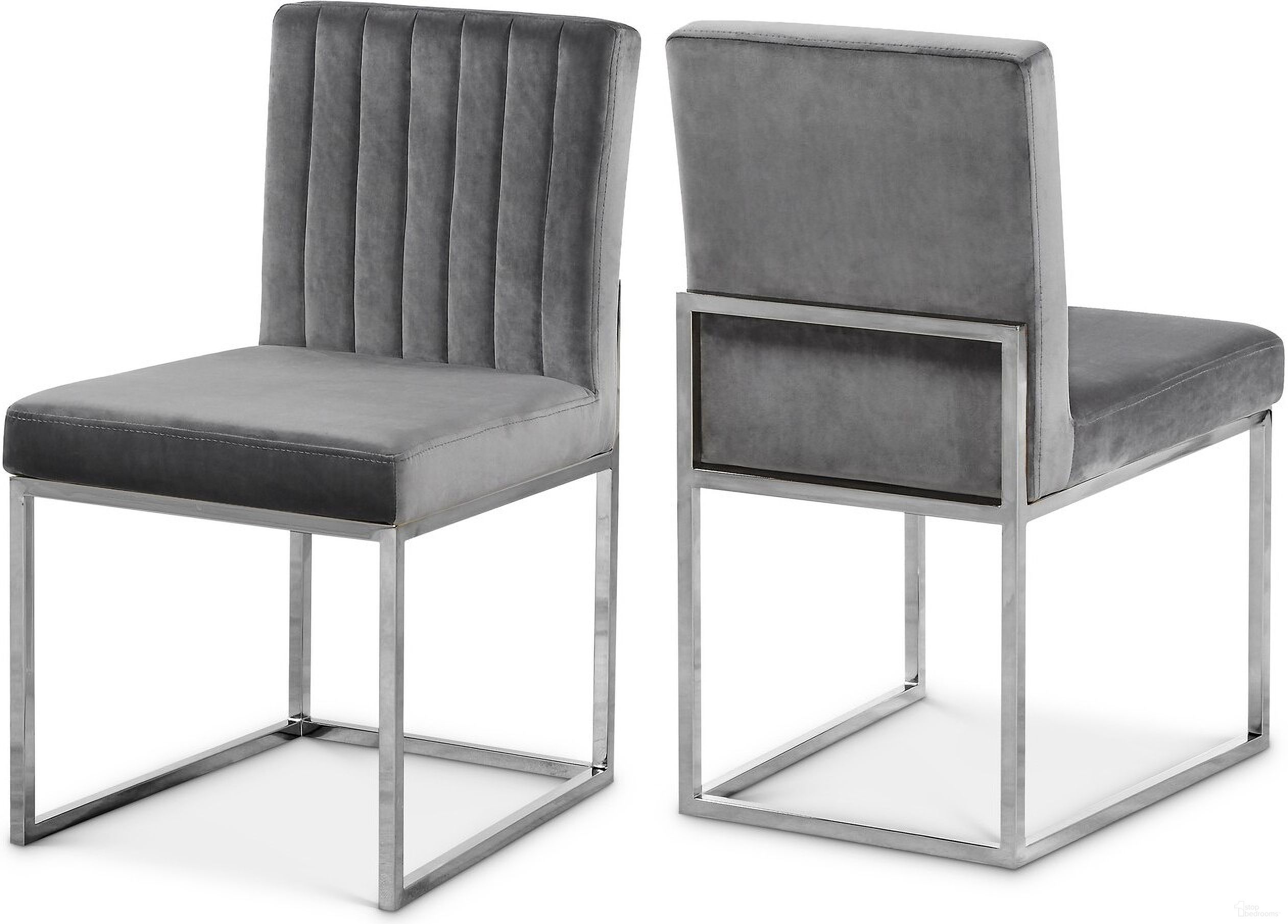 The appearance of Giselle Velvet Dining Chair Set of 2 In Grey/Chrome designed by Meridian in the modern / contemporary interior design. This grey piece of furniture  was selected by 1StopBedrooms from Giselle Collection to add a touch of cosiness and style into your home. Sku: 779Grey-C. Material: Velvet. Chair Type: Side Chair.