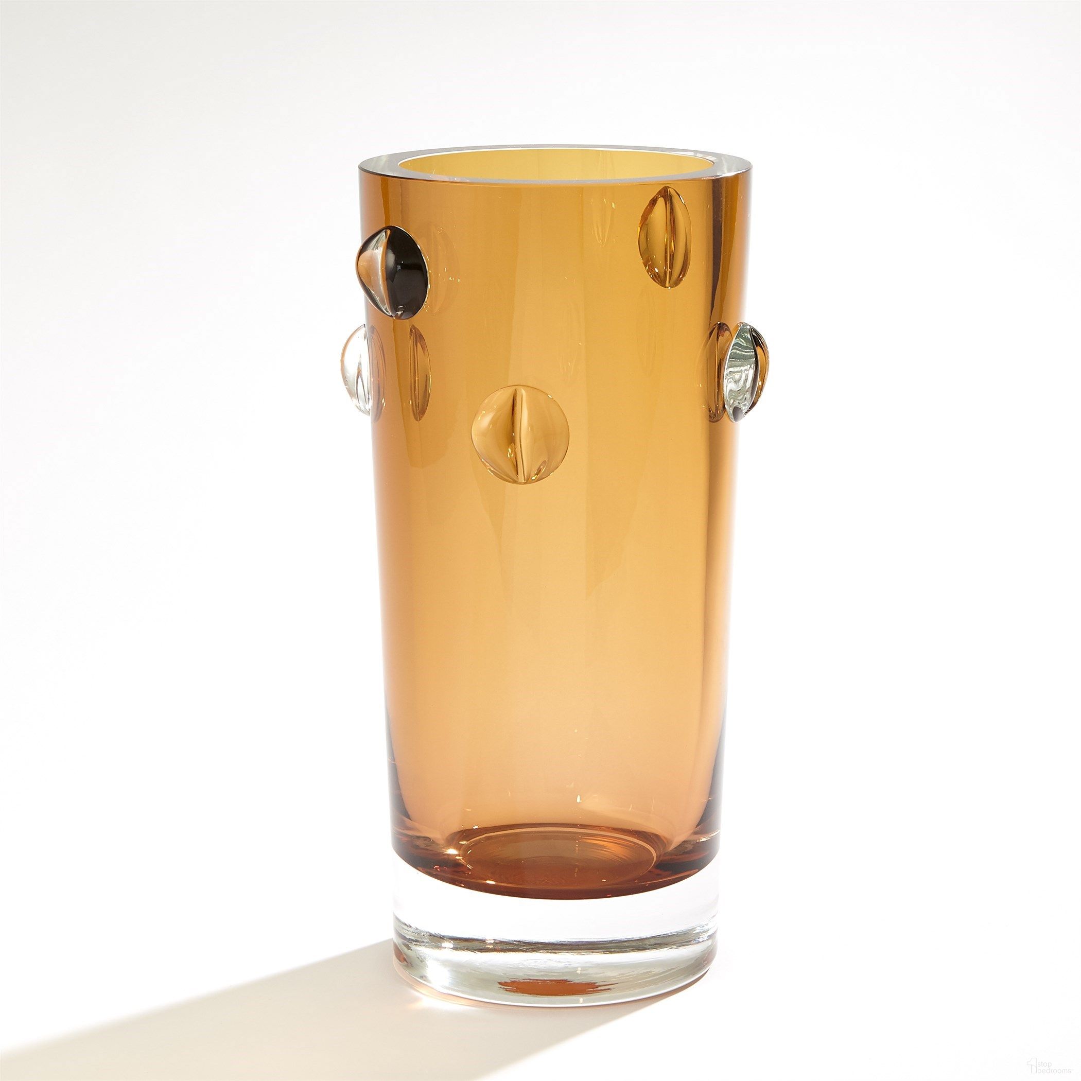 The appearance of Glass Large Vase In Clear designed by Global Views in the modern / contemporary interior design. This clear piece of furniture  was selected by 1StopBedrooms from Glass Collection to add a touch of cosiness and style into your home. Sku: BB-660044. Material: Glass.