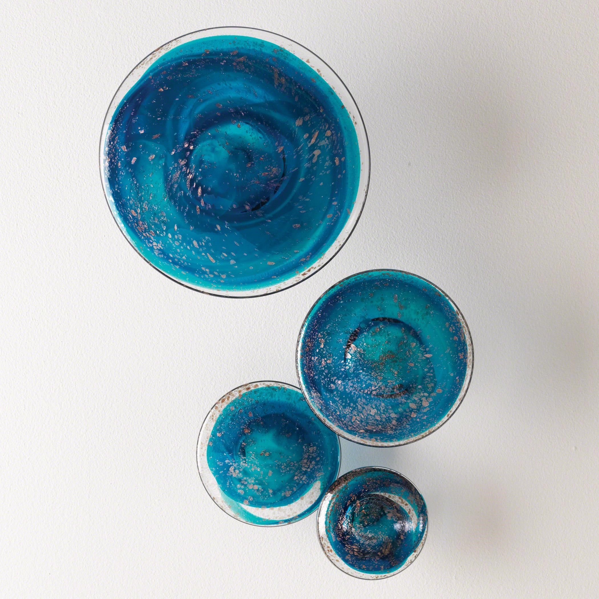 The appearance of Glass Wall Mushrooms Set of 4 In Blue designed by Global Views in the modern / contemporary interior design. This blue piece of furniture was selected by 1StopBedrooms from Glass Collection to add a touch of cosiness and style into your home. Sku: 881936. Material: Glass.