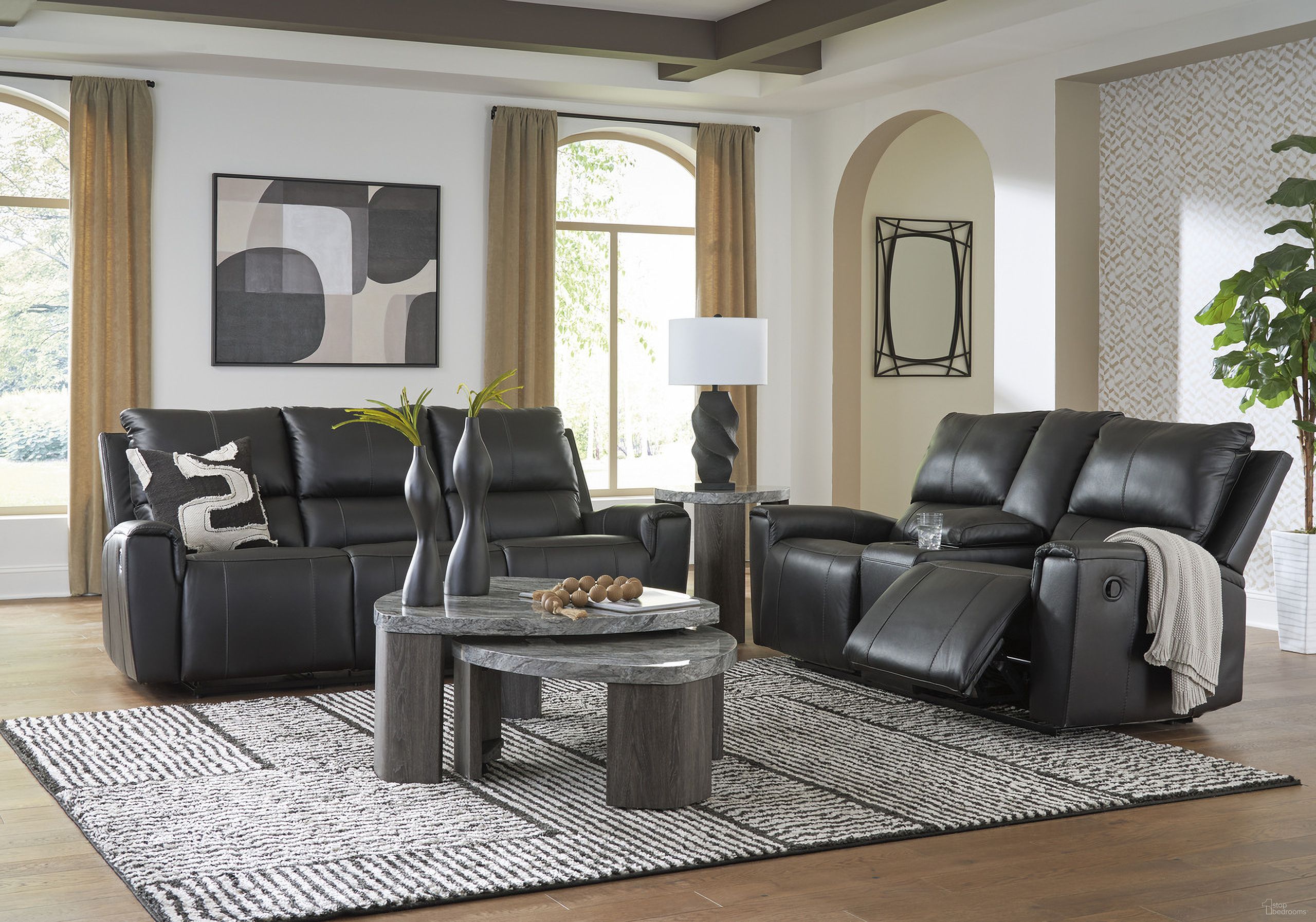 The appearance of Glassmere Reclining Living Room Set In Black designed by Signature Design by Ashley in the modern / contemporary interior design. This black piece of furniture  was selected by 1StopBedrooms from Glassmere Collection to add a touch of cosiness and style into your home. Sku: NCU1170088;NCU1170094. Material: Leather Match.