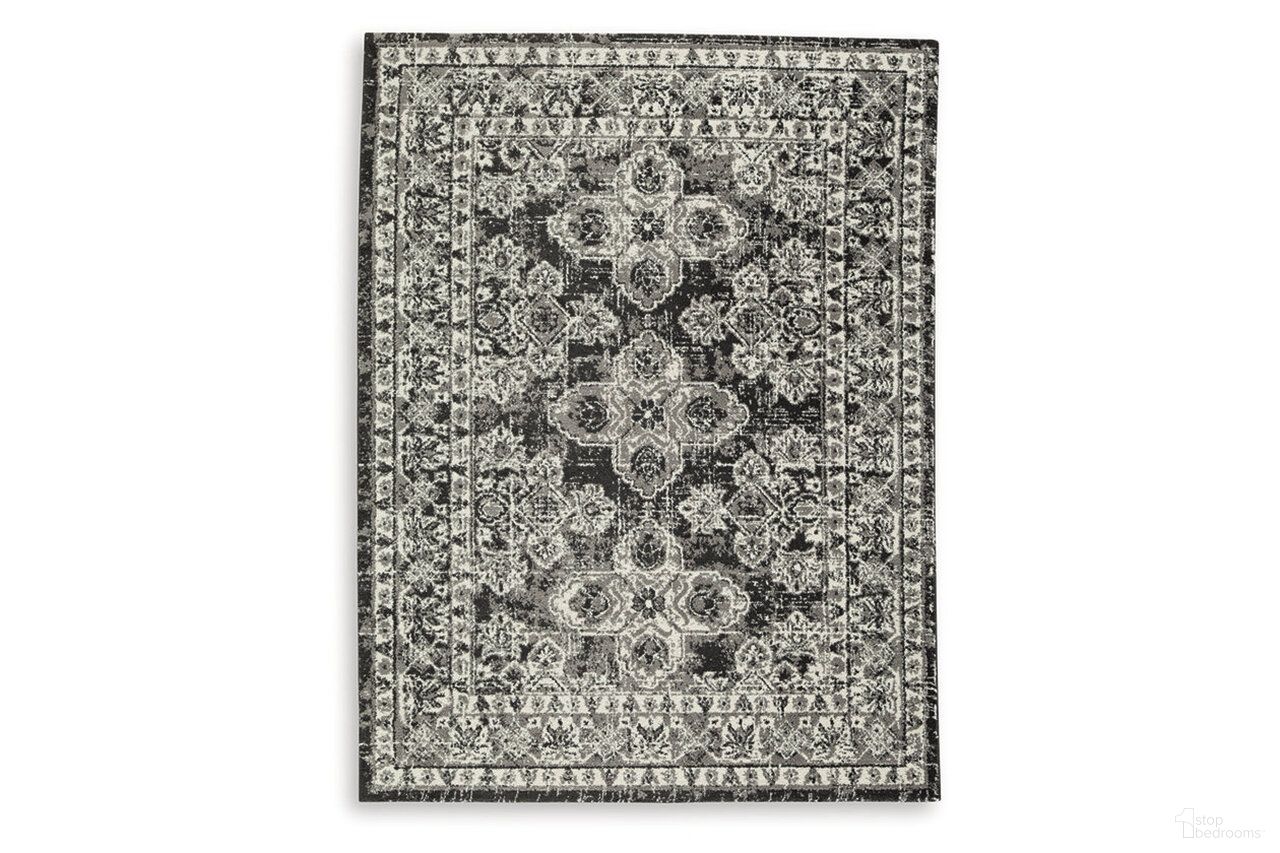The appearance of Glennisman Large Rug In Black/Gray/Ivory designed by Signature Design by Ashley in the traditional interior design. This black/gray/ivory piece of furniture was selected by 1StopBedrooms from Glennisman Collection to add a touch of cosiness and style into your home. Sku: R407271. Material: Fabric.