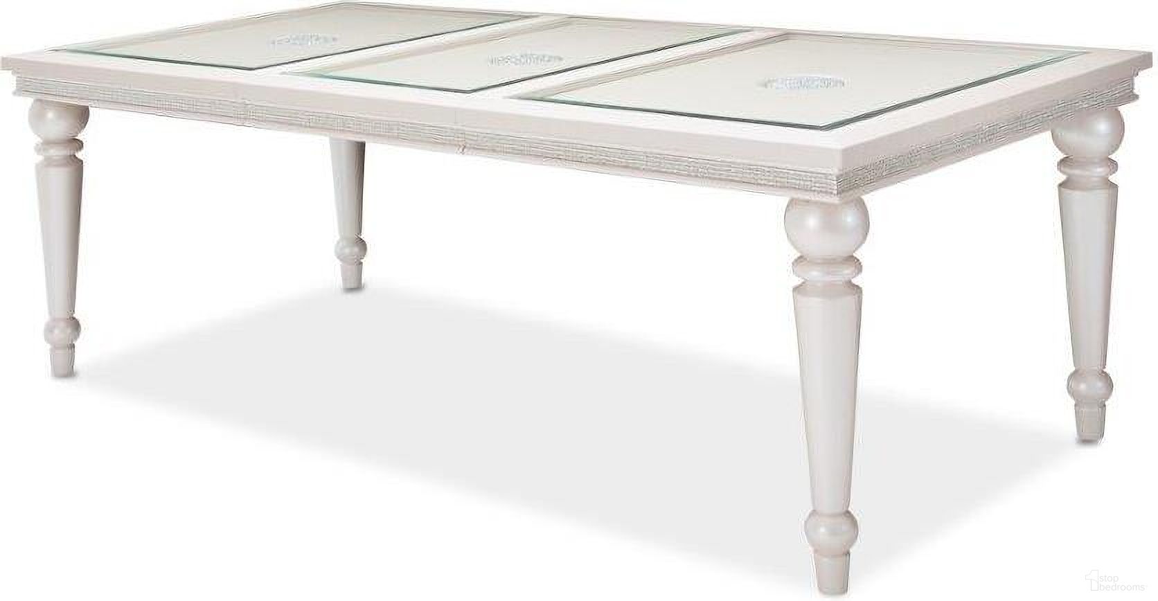 The appearance of Glimmering Heights Dining Table In Ivory designed by Michael Amini in the glam interior design. This ivory piece of furniture  was selected by 1StopBedrooms from Glimmering Heights Collection to add a touch of cosiness and style into your home. Sku: 9011000L-111;9011000T-111. Table Base Style: Legs. Material: Wood. Table Top Shape: Rectangular. Size: 42" x 88".