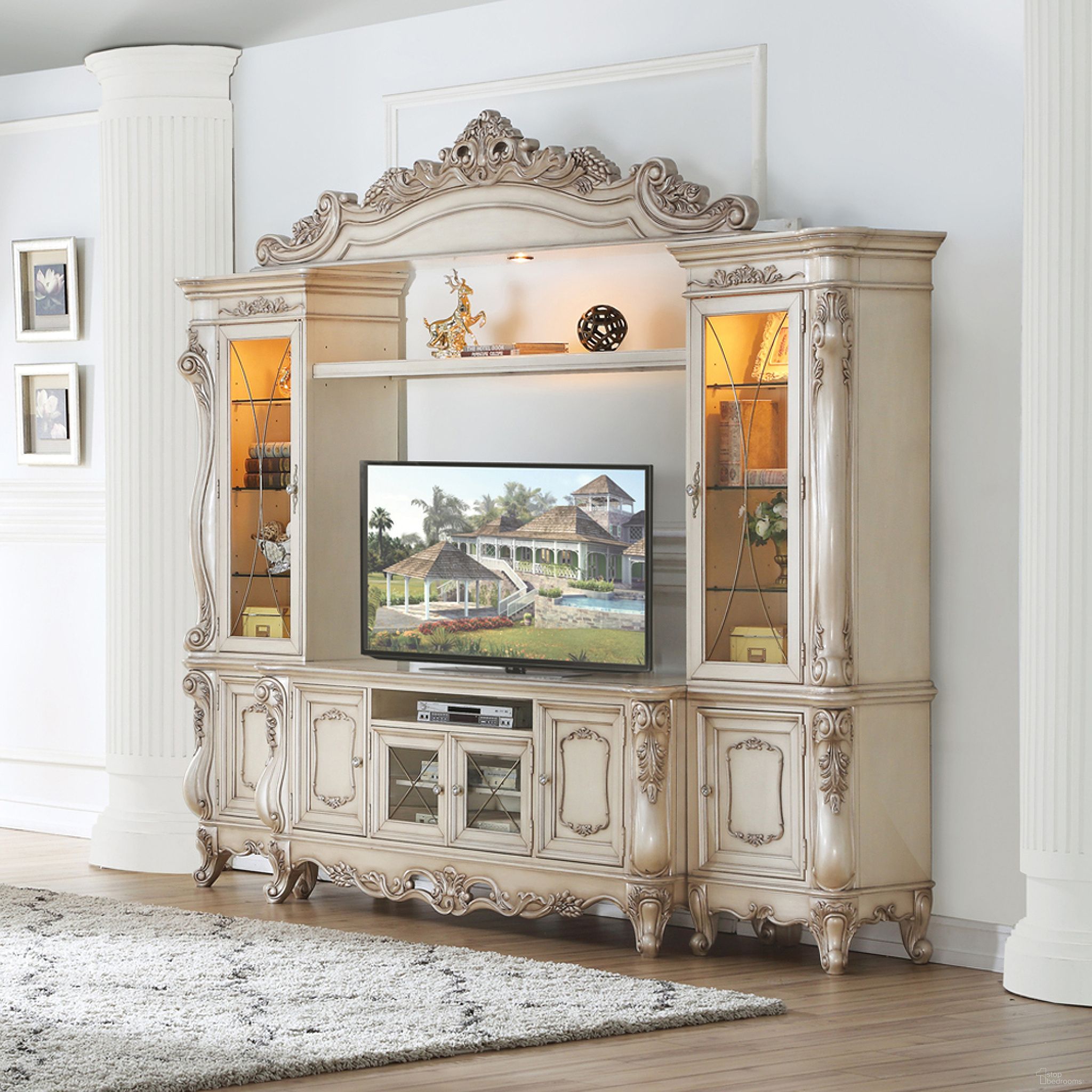 The appearance of Gorsedd Antique White Entertainment Center - Side Piers and Bridge designed by ACME in the transitional interior design. This antique white piece of furniture was selected by 1StopBedrooms from Gorsedd Collection to add a touch of cosiness and style into your home. Sku: 91440LP;91441RP;91442BRD. Material: Wood.