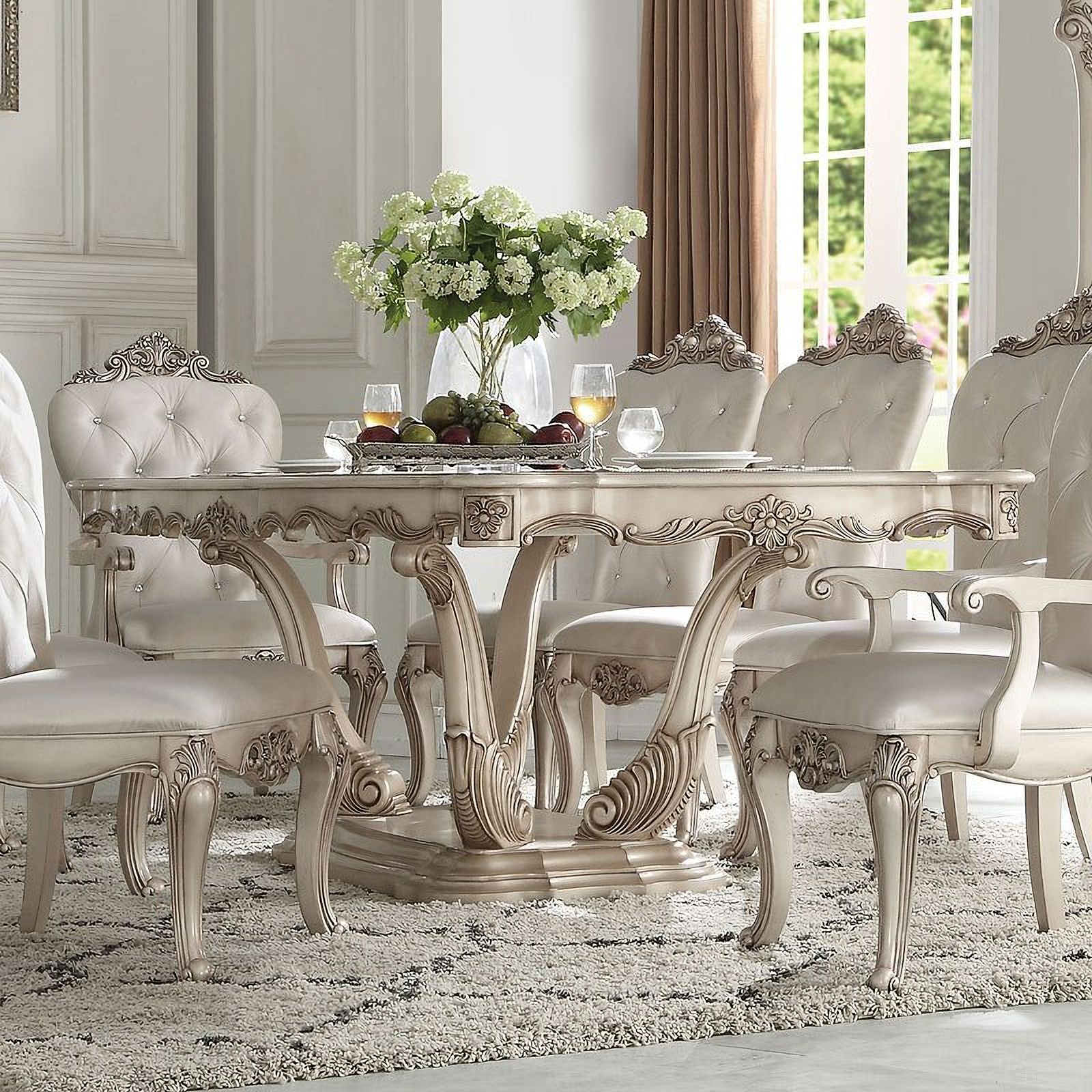 The appearance of Gorsedd Dining Room Set designed by ACME in the transitional interior design. This antique white piece of furniture was selected by 1StopBedrooms from Gorsedd Collection to add a touch of cosiness and style into your home. Sku: 67440T;67441ST;67442. Table Base Style: Pedestal. Material: Wood. Size: 44".