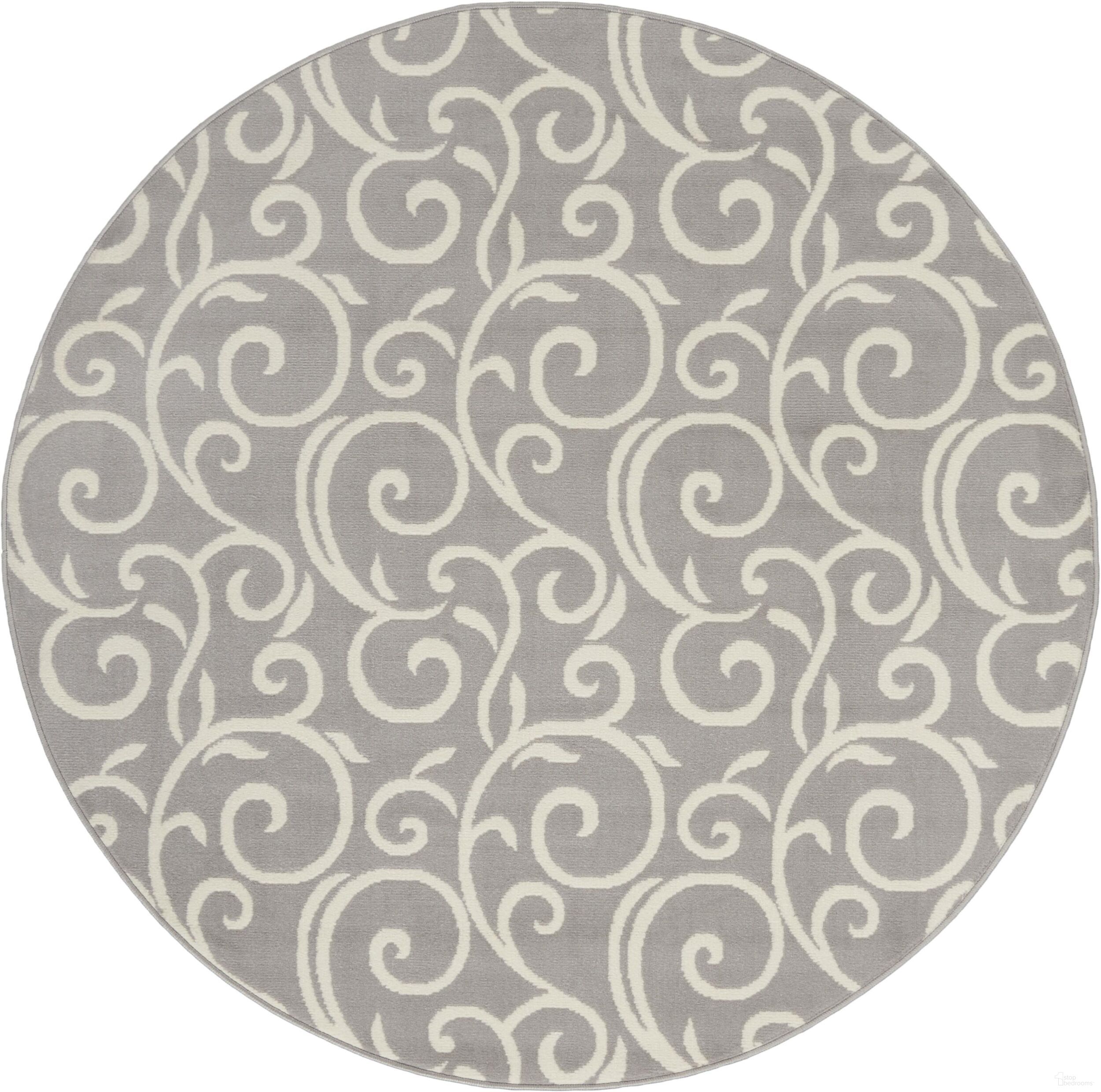 The appearance of Grafix Grey 5'3" x 5'3" Round Contemporary Area Rug designed by Nourison in the modern / contemporary interior design. This grey piece of furniture was selected by 1StopBedrooms from Grafix Collection to add a touch of cosiness and style into your home. Sku: 99446459183. Material: Polypropylene.