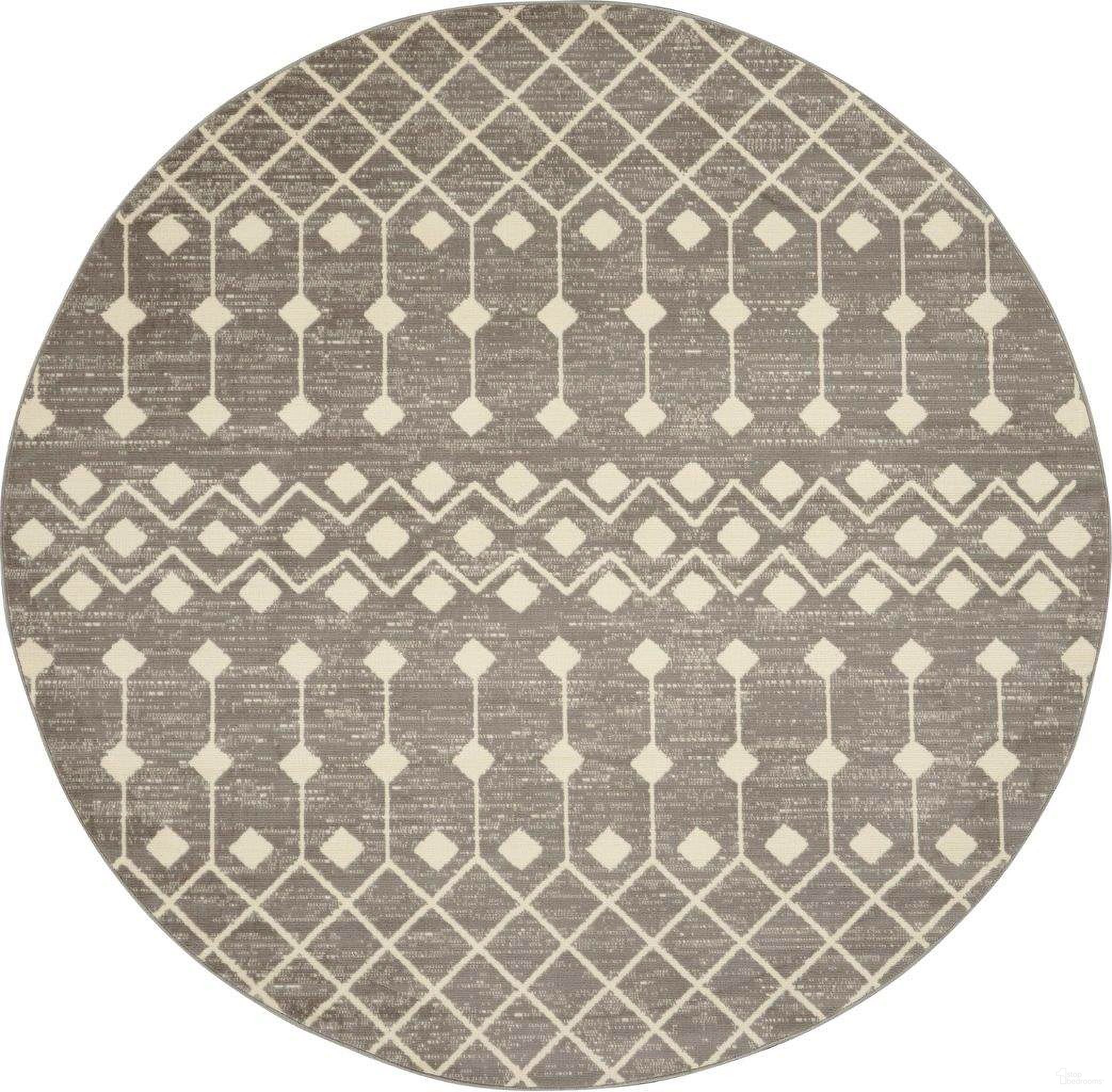 The appearance of Grafix Grey 8' x 8' Round Bohemian Area Rug designed by Nourison in the bohemian interior design. This grey piece of furniture was selected by 1StopBedrooms from Grafix Collection to add a touch of cosiness and style into your home. Sku: 99446753069. Material: Polypropylene.