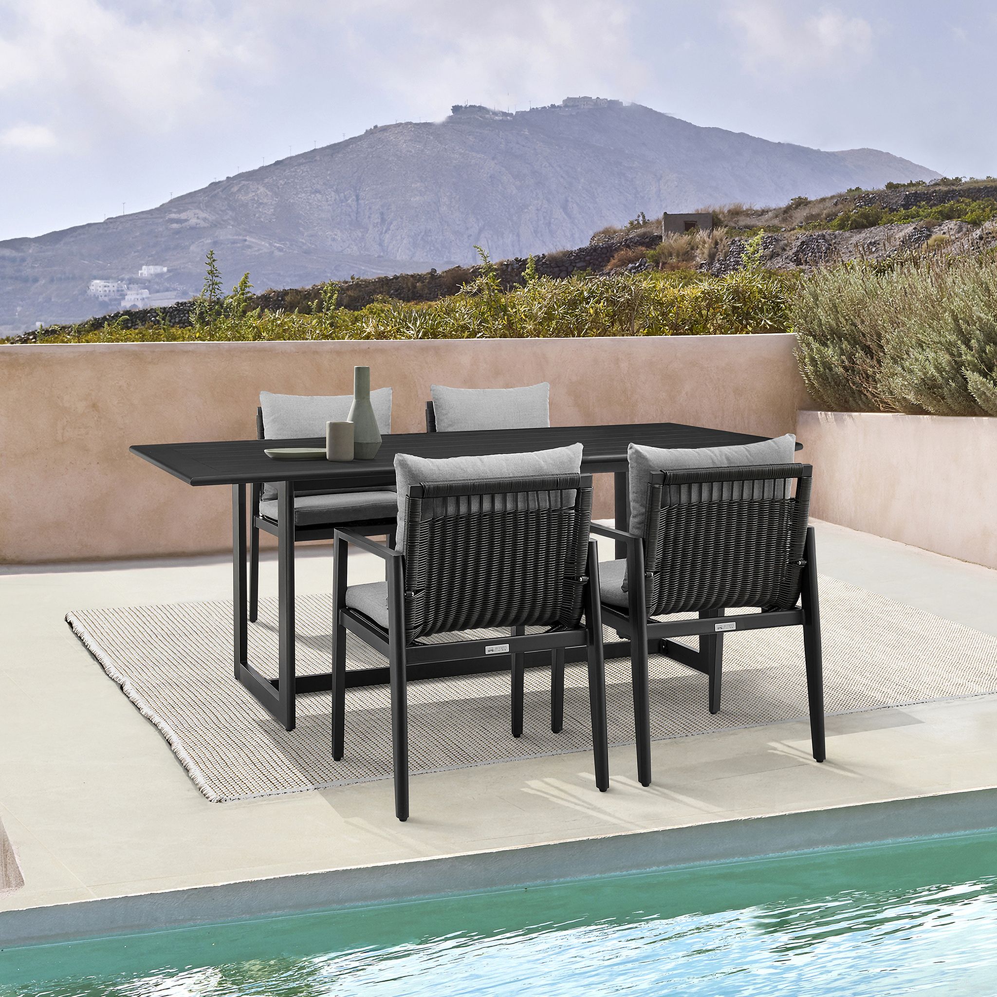 The appearance of Grand Outdoor Patio 5-Piece Dining Table Set In Aluminum with Gray Cushions designed by Armen Living in the modern / contemporary interior design. This gray piece of furniture was selected by 1StopBedrooms from Grand Collection to add a touch of cosiness and style into your home. Sku: 795154121779;795154121755;840254332683. Material: Aluminum.