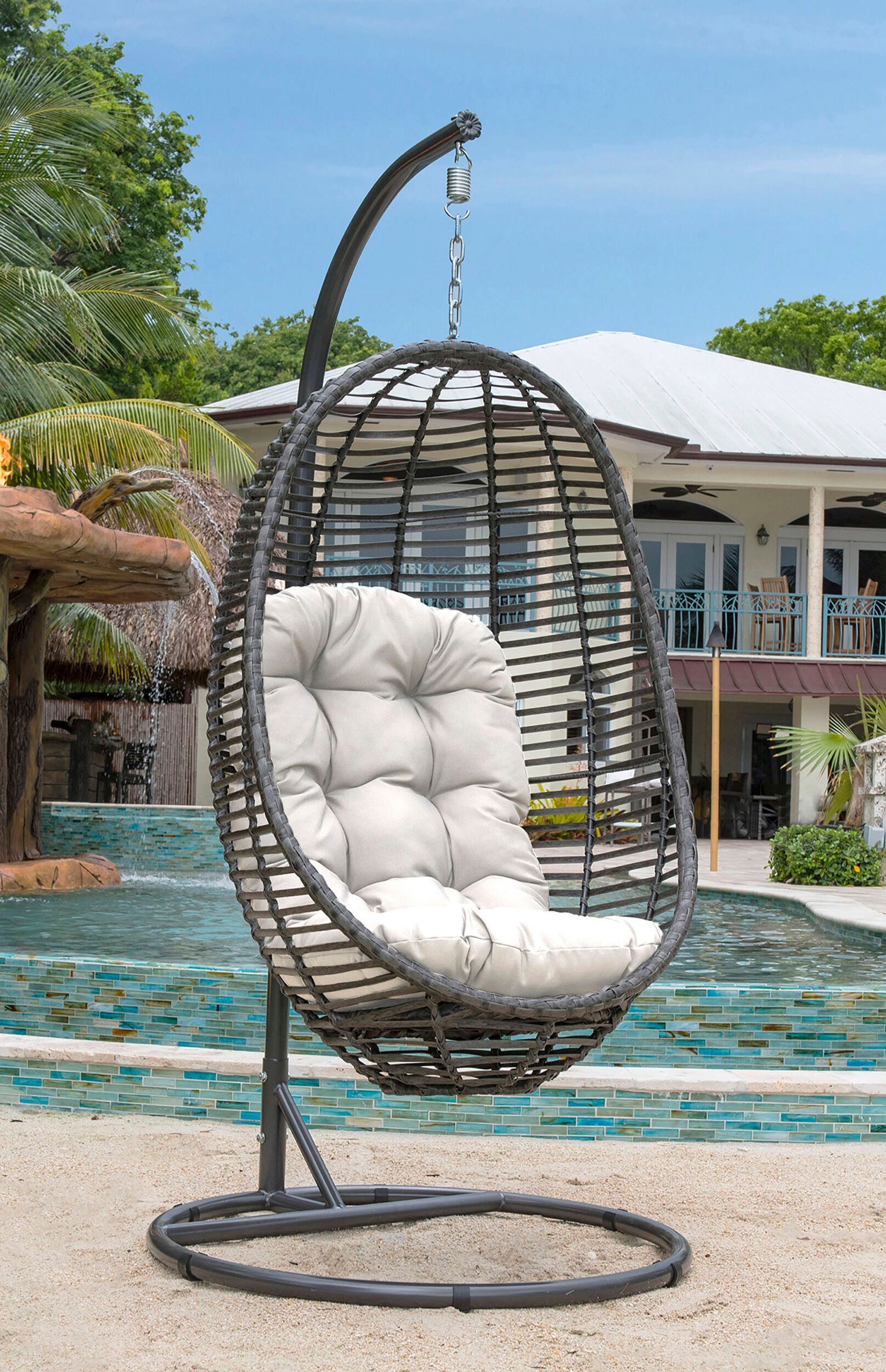 The appearance of Graphite 2-Piece Hanging Chair with Cushion In Gray designed by Pelican Reef in the traditional interior design. This gray piece of furniture was selected by 1StopBedrooms from Graphite Collection to add a touch of cosiness and style into your home. Sku: PJO-1601-GRY-2HC. Material: Aluminum.