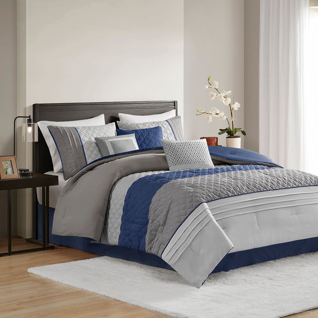 The appearance of Greer 7 Piece Color Block Stripe California King Comforter Set with Throw Pillows In Blue designed by Olliix in the modern / contemporary interior design. This blue piece of furniture  was selected by 1StopBedrooms from Greer Collection to add a touch of cosiness and style into your home. Sku: MP10-8323. Material: Polyester. Bed Size: California King.