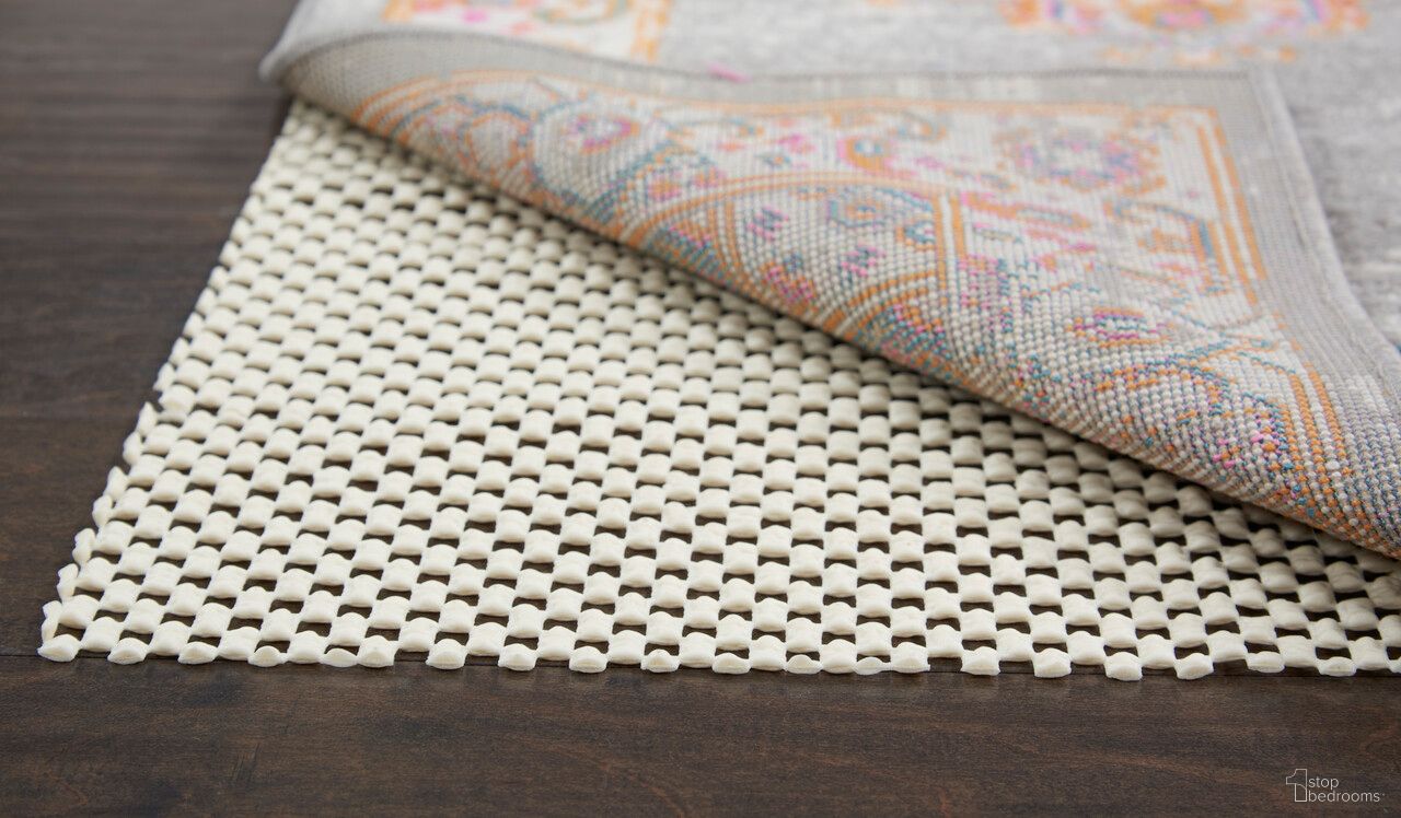 The appearance of Grid-Loc Rectangle Non-Slip 3'4" x 5' Rug Pad In Ivory designed by Nourison in the transitional interior design. This ivory piece of furniture was selected by 1StopBedrooms from Grid Loc Collection to add a touch of cosiness and style into your home. Sku: 99446475831. Material: PVC.