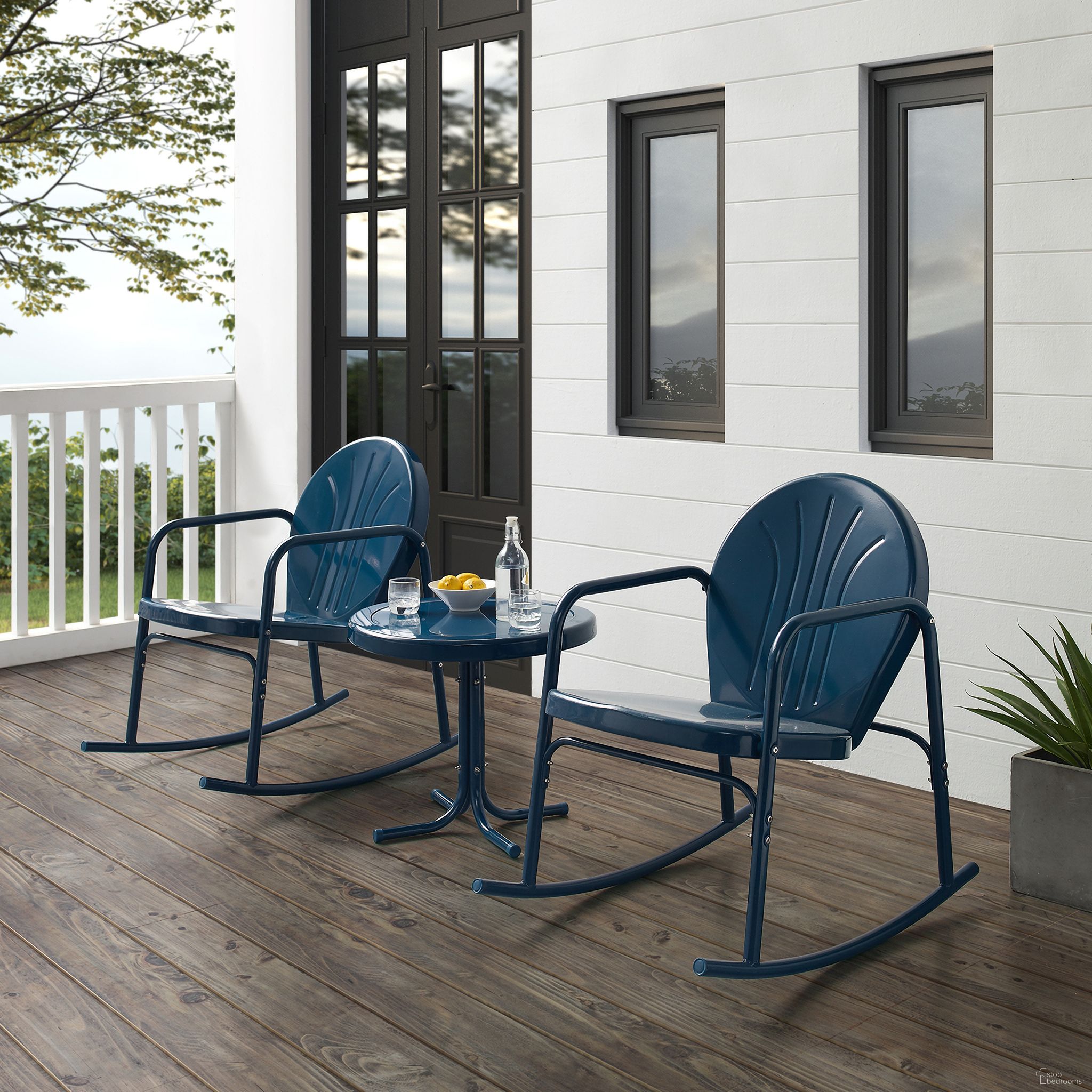 The appearance of Griffith 3 Piece Retro Outdoor Rocking Chair Set In Navy Gloss designed by Crosley Brands in the transitional interior design. This navy piece of furniture  was selected by 1StopBedrooms from Griffith Collection to add a touch of cosiness and style into your home. Sku: CO1013-NV;CO1011A-NV. Material: Steel.