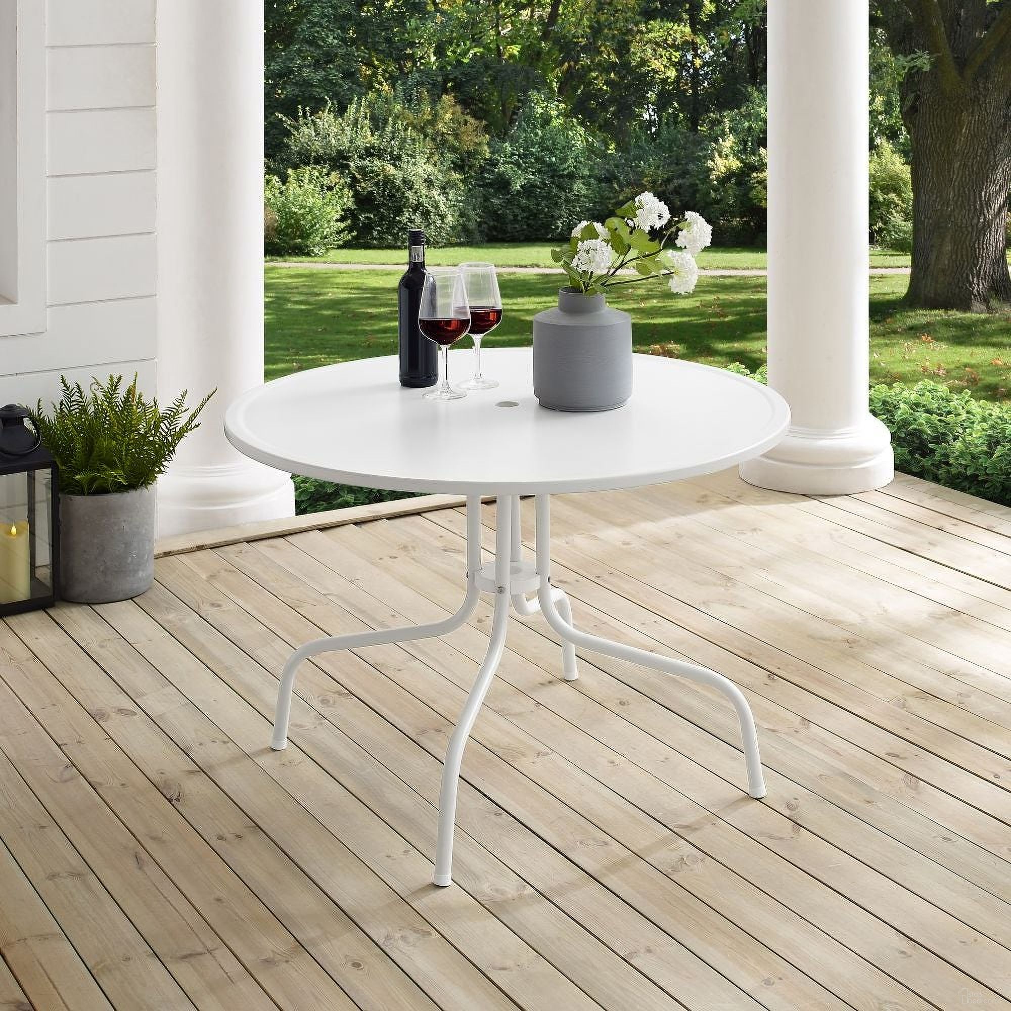 The appearance of Griffith 39 Inch Round Retro Outdoor Dining Table In White Satin designed by Crosley Brands in the transitional interior design. This white piece of furniture was selected by 1StopBedrooms from Griffith Collection to add a touch of cosiness and style into your home. Sku: CO1012A-WH. Material: Steel.