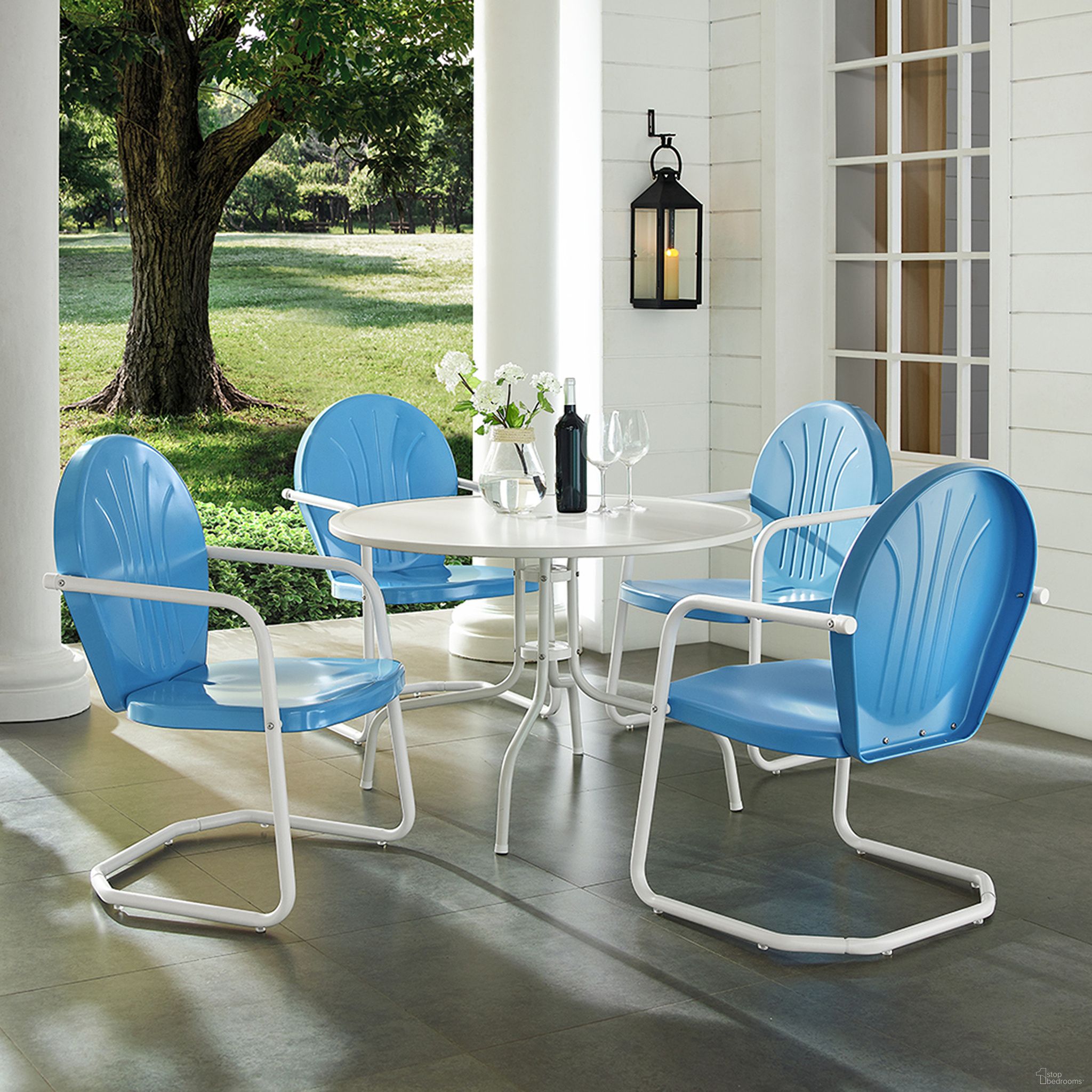 The appearance of Griffith 5 Piece Round Retro Outdoor Dining Set In Sky Blue Gloss and White Satin designed by Crosley Brands in the transitional interior design. This sky blue piece of furniture  was selected by 1StopBedrooms from Griffith Collection to add a touch of cosiness and style into your home. Sku: CO1012A-WH;CO1001A-BL;CO1001A-BL;CO1001A-BL;CO1001A-BL. Material: Steel.