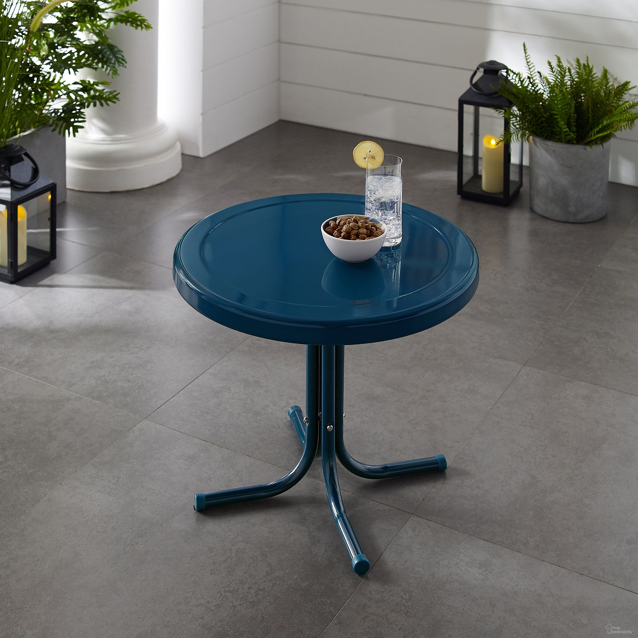 The appearance of Griffith Retro Outdoor Side Table In Navy Gloss designed by Crosley Brands in the transitional interior design. This navy piece of furniture  was selected by 1StopBedrooms from Griffith Collection to add a touch of cosiness and style into your home. Sku: CO1011A-NV. Material: Steel.