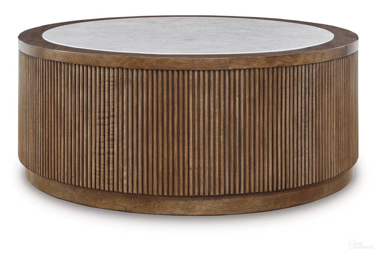 The appearance of Hadonna Coffee Table In Brown designed by Signature Design by Ashley in the transitional interior design. This brown piece of furniture  was selected by 1StopBedrooms from Hadonna Collection to add a touch of cosiness and style into your home. Sku: T658-8. Material: Wood.