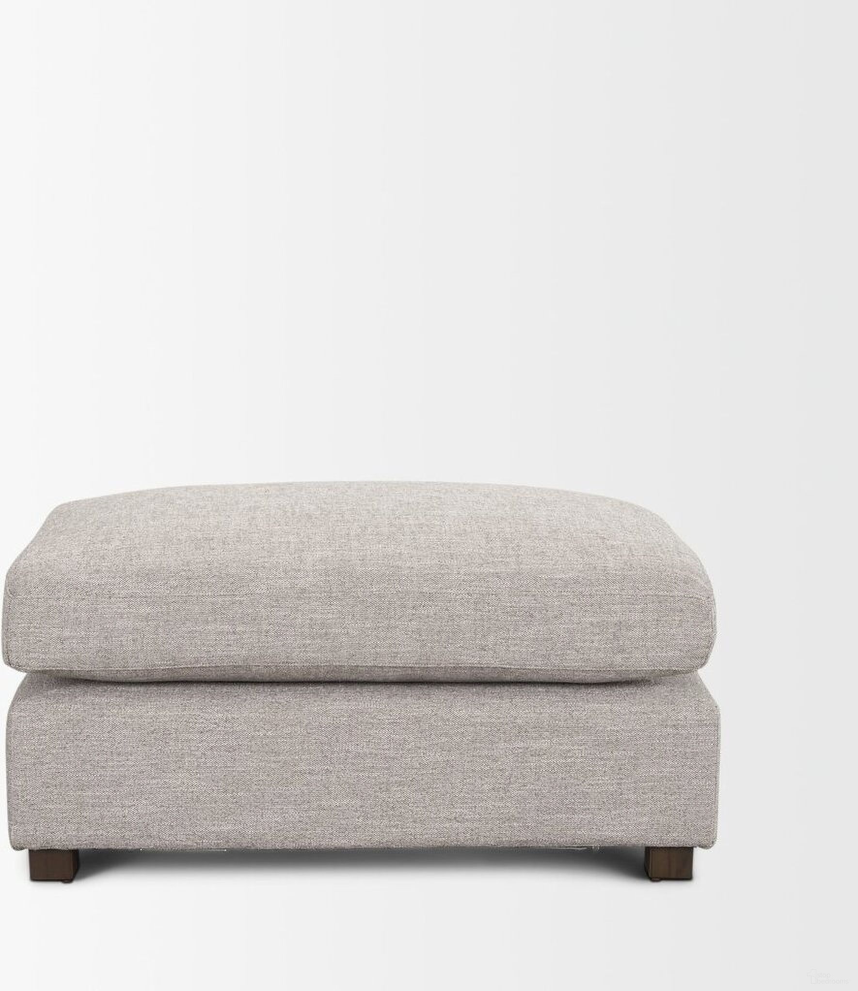 The appearance of Halston Small Ottoman In Gray designed by Mercana in the transitional interior design. This gray piece of furniture was selected by 1StopBedrooms from Halston Collection to add a touch of cosiness and style into your home. Sku: 70475. Material: Fabric.