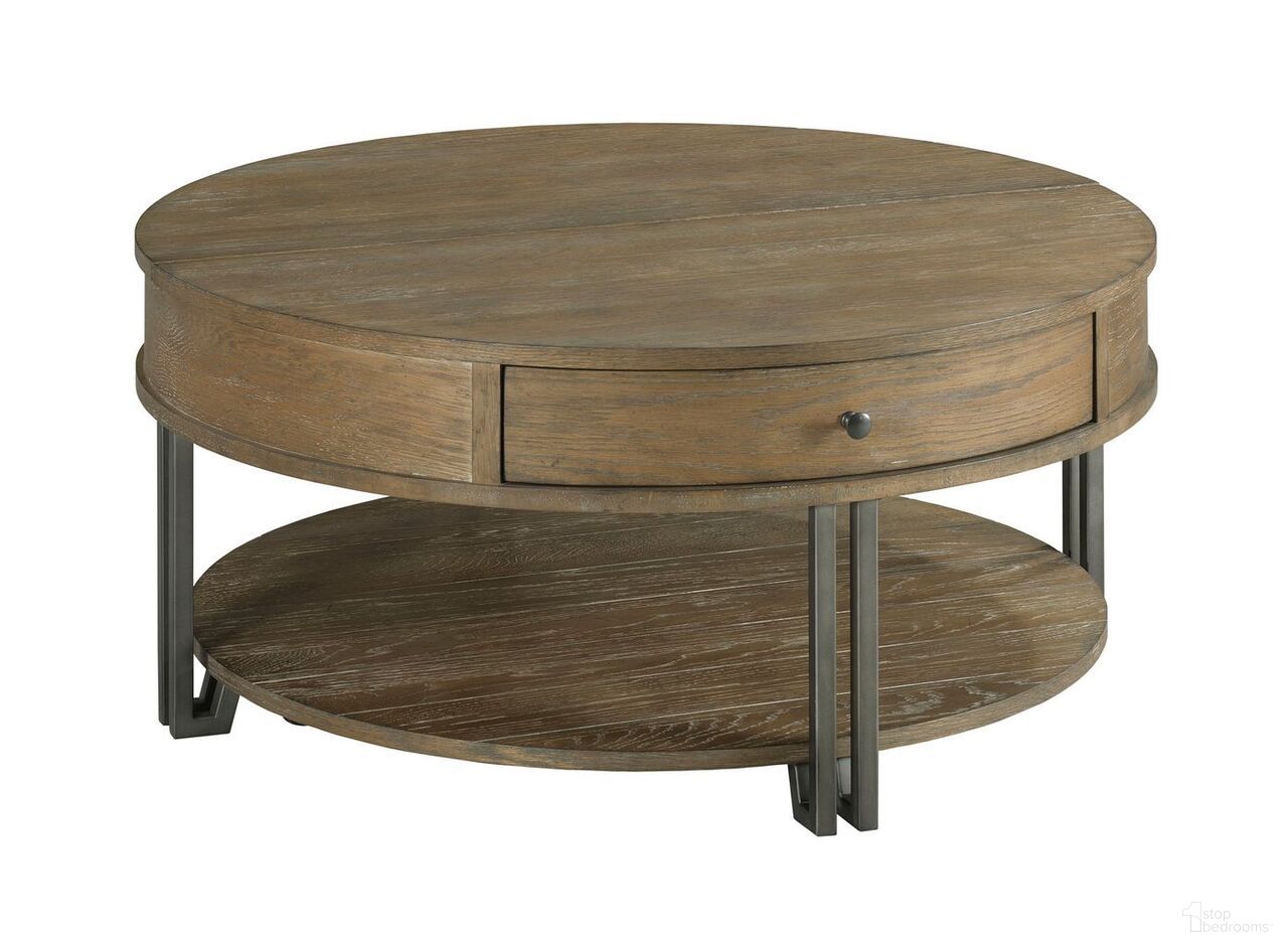 The appearance of Hamilton Round Lift Top Coffee Table In Cinnamon designed by Hammary in the transitional interior design. This cinnamon piece of furniture  was selected by 1StopBedrooms from Hamilton Collection to add a touch of cosiness and style into your home. Sku: 954-911. Material: Wood.