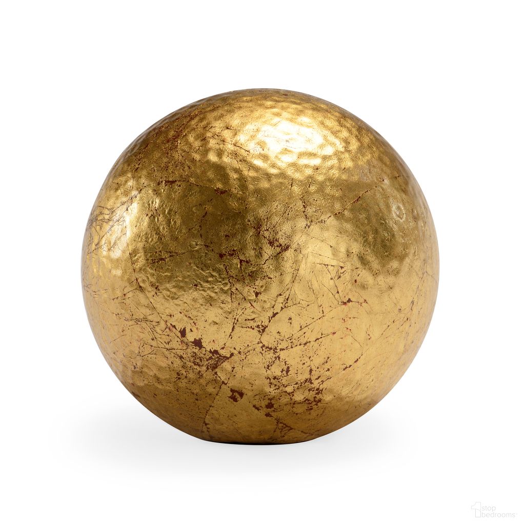The appearance of Hammered Ball - Medium In Gold designed by Chelsea House in the modern / contemporary interior design. This gold piece of furniture  was selected by 1StopBedrooms from Claire Bell Collection to add a touch of cosiness and style into your home. Sku: 383043. Material: Composite.