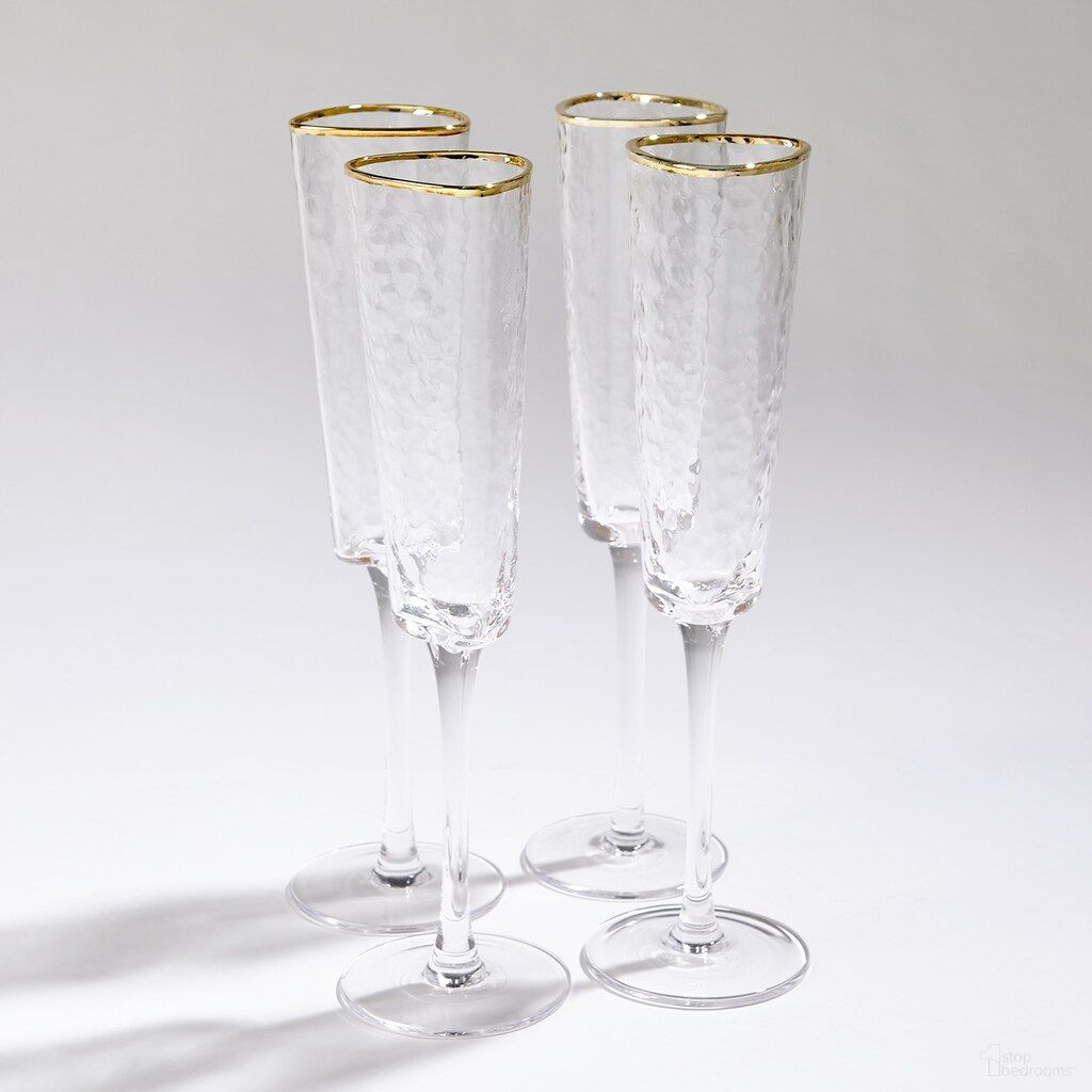 The appearance of Hammered Champagne Glasses Set of 4 In Clear and Gold designed by Global Views in the modern / contemporary interior design. This clear/gold piece of furniture was selected by 1StopBedrooms from Hammered Collection to add a touch of cosiness and style into your home. Sku: 882899. Material: Glass.
