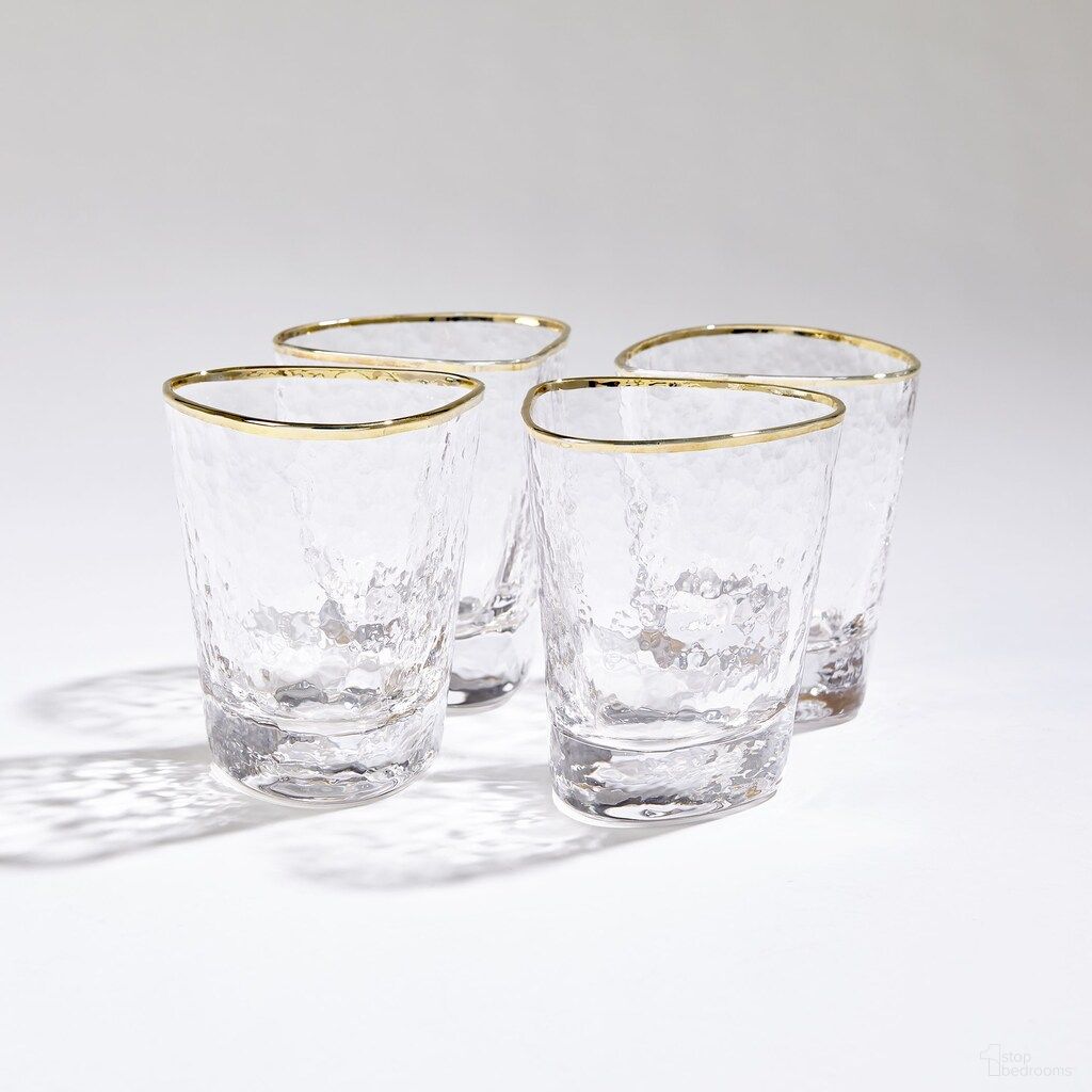The appearance of Hammered DOF Glasses Set of 4 In Clear and Gold designed by Global Views in the modern / contemporary interior design. This clear/gold piece of furniture was selected by 1StopBedrooms from Hammered Collection to add a touch of cosiness and style into your home. Sku: 882901. Material: Glass.