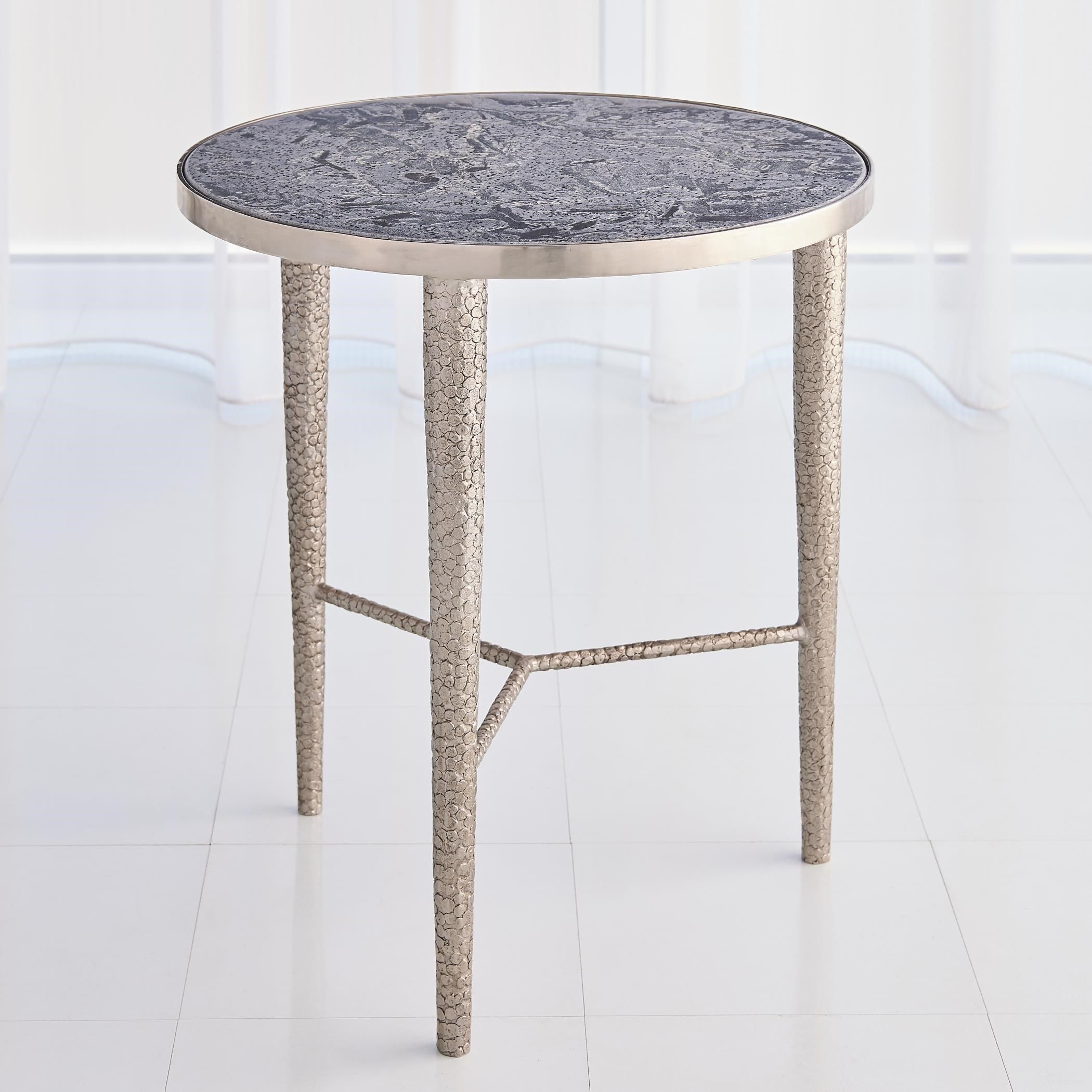 The appearance of Hammered End Table In Antique Nickel With Grey Marble designed by Global Views in the modern / contemporary interior design. This gray piece of furniture  was selected by 1StopBedrooms from Hammered Collection to add a touch of cosiness and style into your home. Sku: 791139. Material: Iron.