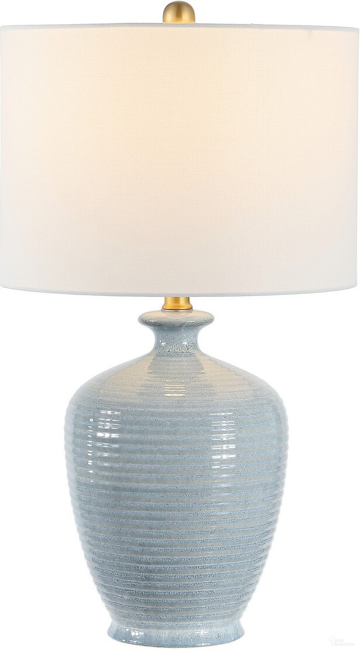 The appearance of Hanron Table Lamp in Blue designed by Safavieh in the modern / contemporary interior design. This blue piece of furniture was selected by 1StopBedrooms from Hanron Collection to add a touch of cosiness and style into your home. Sku: TBL4370A. Material: Ceramic.