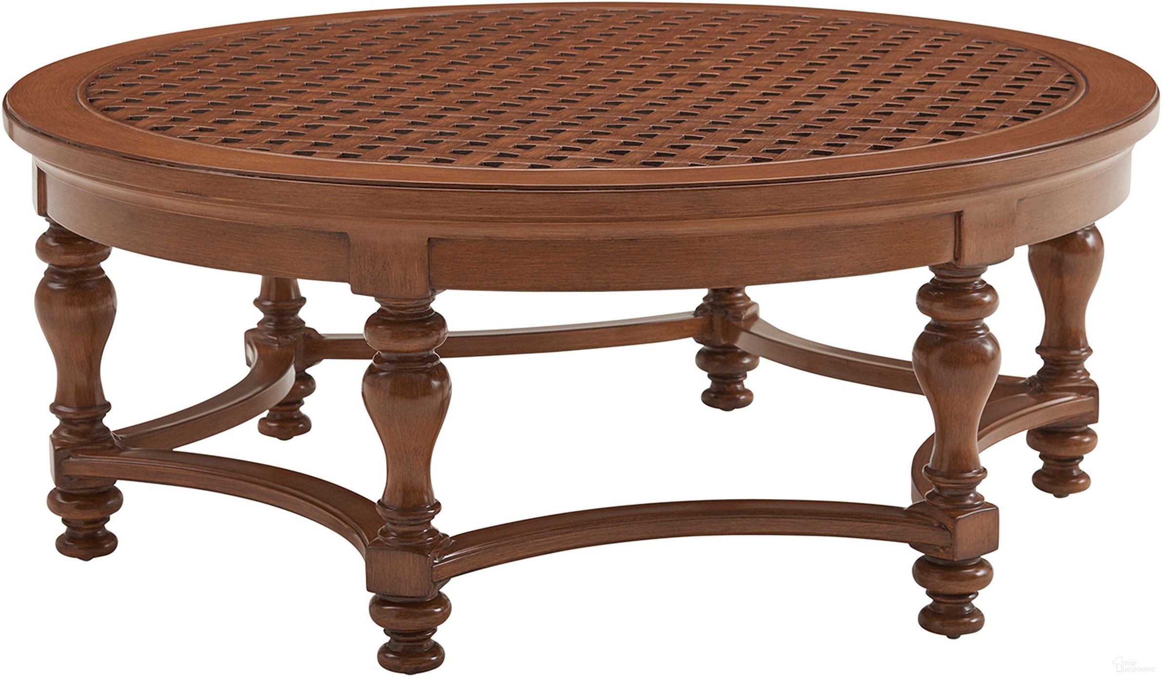 The appearance of Harbor Isle Round Cocktail Table In Walnut designed by Tommy Bahama in the transitional interior design. This walnut piece of furniture  was selected by 1StopBedrooms from Harbor Isle Collection to add a touch of cosiness and style into your home. Sku: 3935-947. Material: Wood.