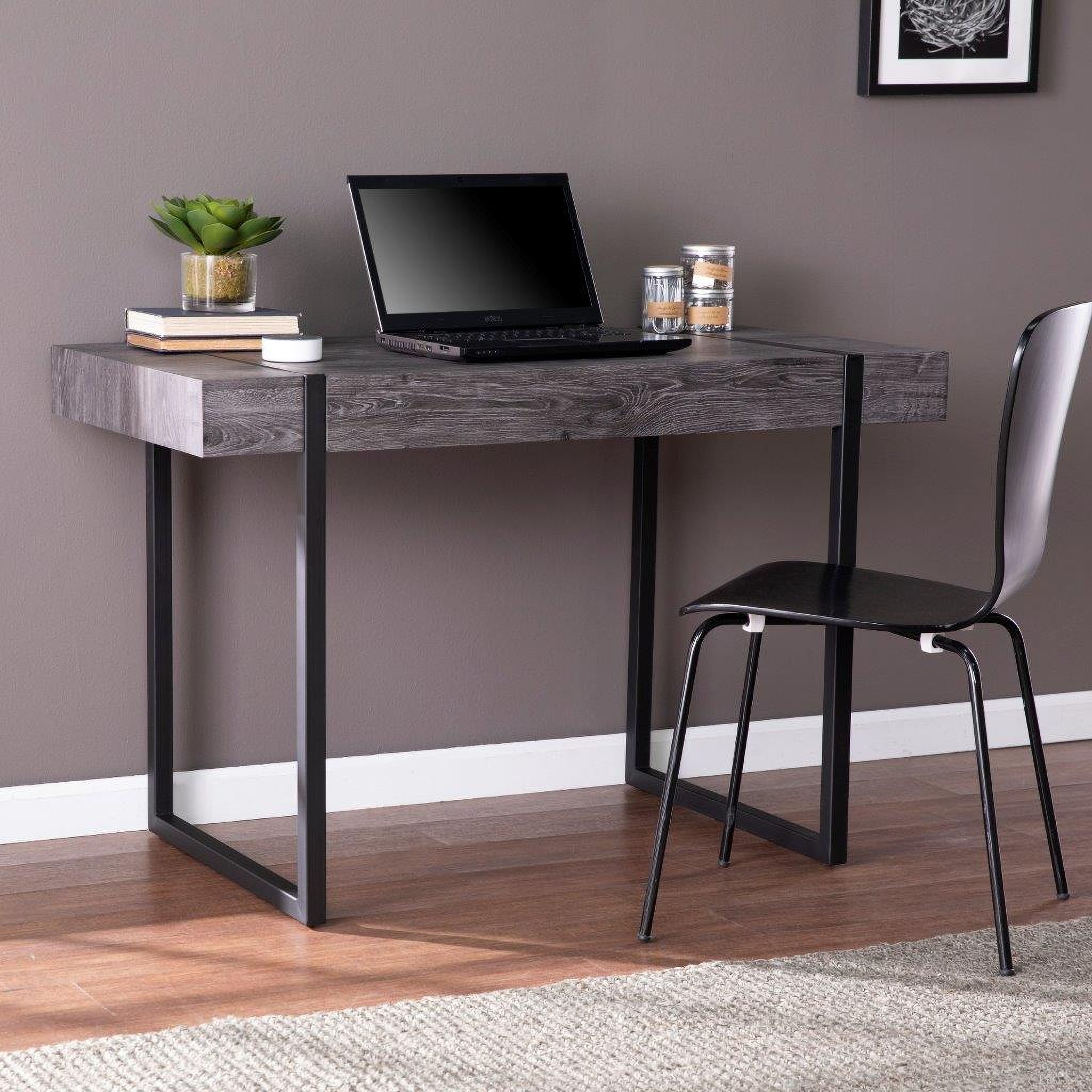 The appearance of Harkriven Small Space Desk designed by SEI Furniture in the transitional interior design. This black piece of furniture was selected by 1StopBedrooms from Harkriven Collection to add a touch of cosiness and style into your home. Sku: HO1094537. Material: Wood.