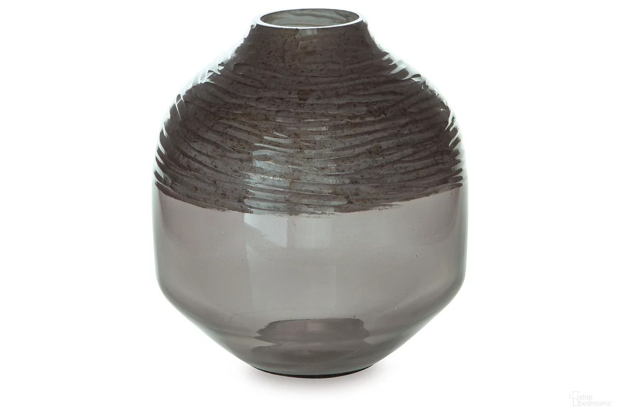 The appearance of Harpwick 8 Inch Vase In Iridescent Gray designed by Signature Design by Ashley in the modern / contemporary interior design. This iridescent gray piece of furniture was selected by 1StopBedrooms from Harpwick Collection to add a touch of cosiness and style into your home. Sku: A2000725. Material: Glass.