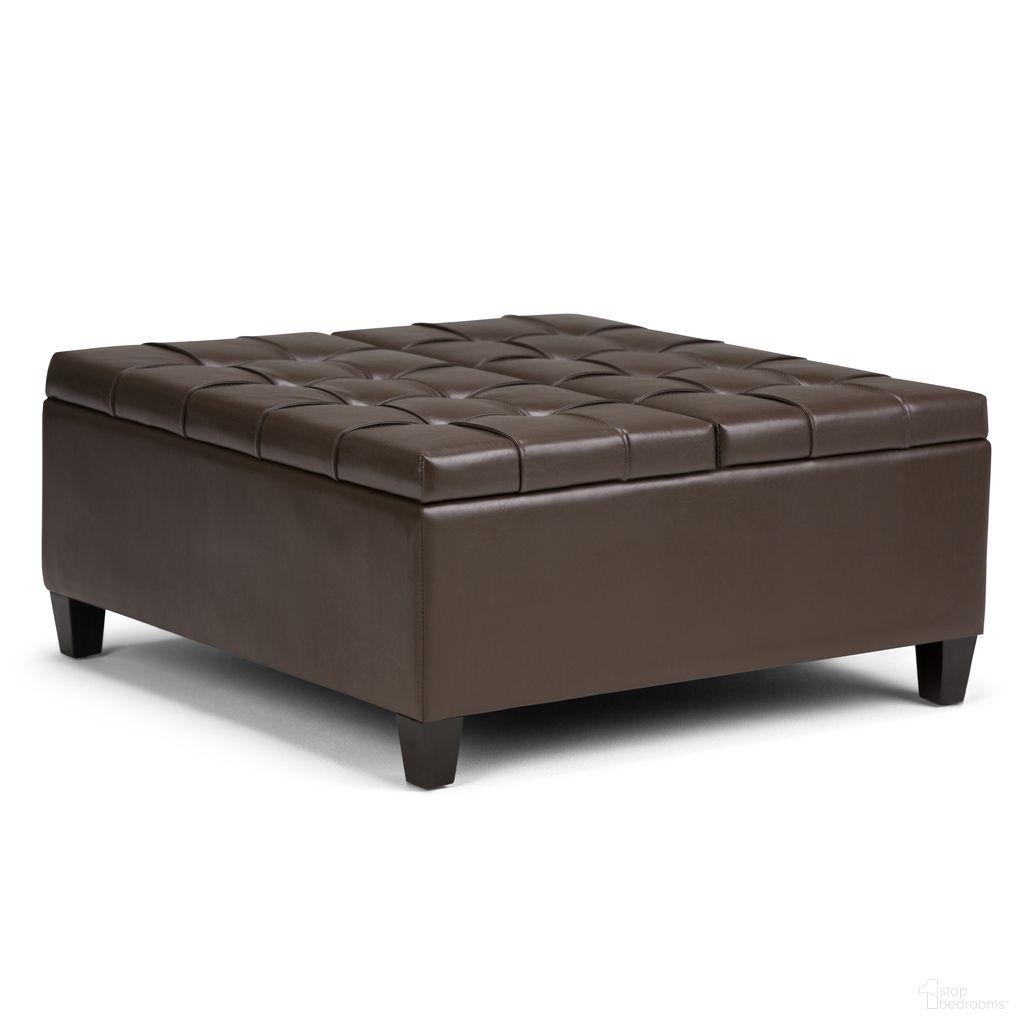 The appearance of Harrison Vegan Faux Leather Coffee Table Storage Ottoman In Chocolate Brown designed by Simpli Home in the transitional interior design. This chocolate brown piece of furniture  was selected by 1StopBedrooms from Harrison Collection to add a touch of cosiness and style into your home. Sku: AXCOT-265-CBR. Material: Faux Leather.