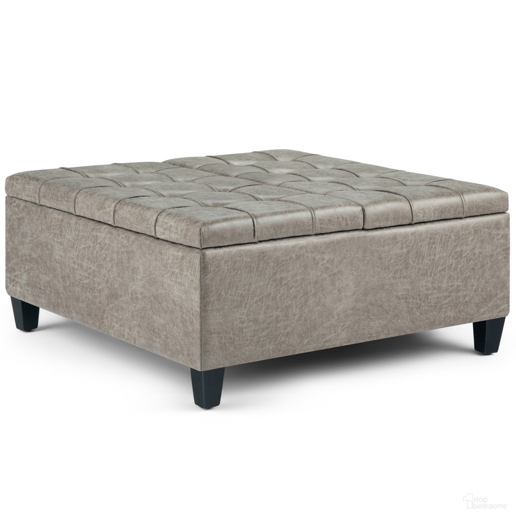 The appearance of Harrison Vegan Faux Leather Coffee Table Storage Ottoman In Distressed Grey Taupe designed by Simpli Home in the transitional interior design. This distressed grey taupe piece of furniture was selected by 1StopBedrooms from Harrison Collection to add a touch of cosiness and style into your home. Sku: AXCOT-265-DTP. Material: Faux Leather.