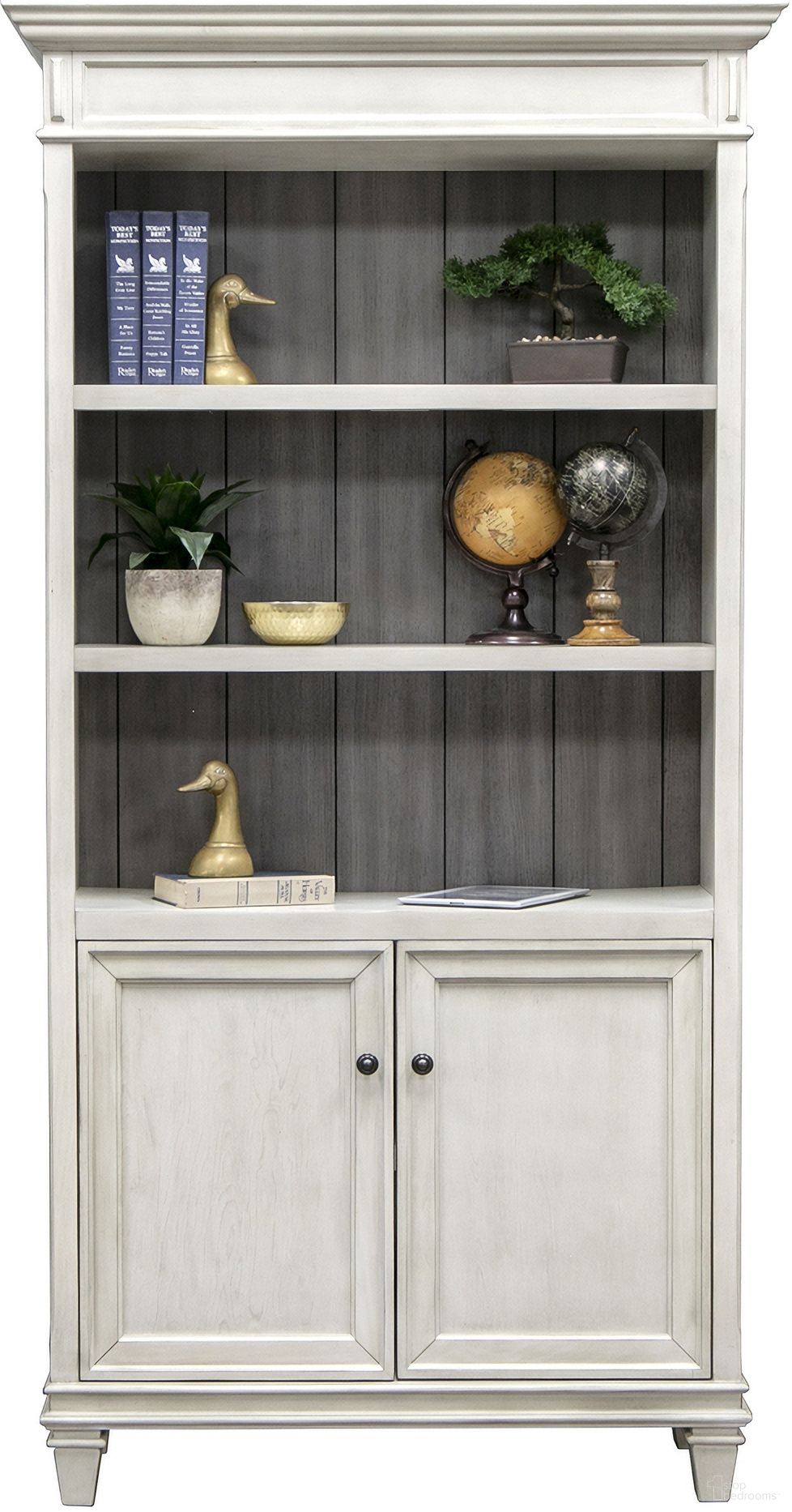 The appearance of Hartford Wood Bookcase with Doors In White designed by Martin Furniture in the traditional interior design. This white and grey piece of furniture was selected by 1StopBedrooms from Hartford Collection to add a touch of cosiness and style into your home. Sku: IMHF4078DW. Material: Wood.