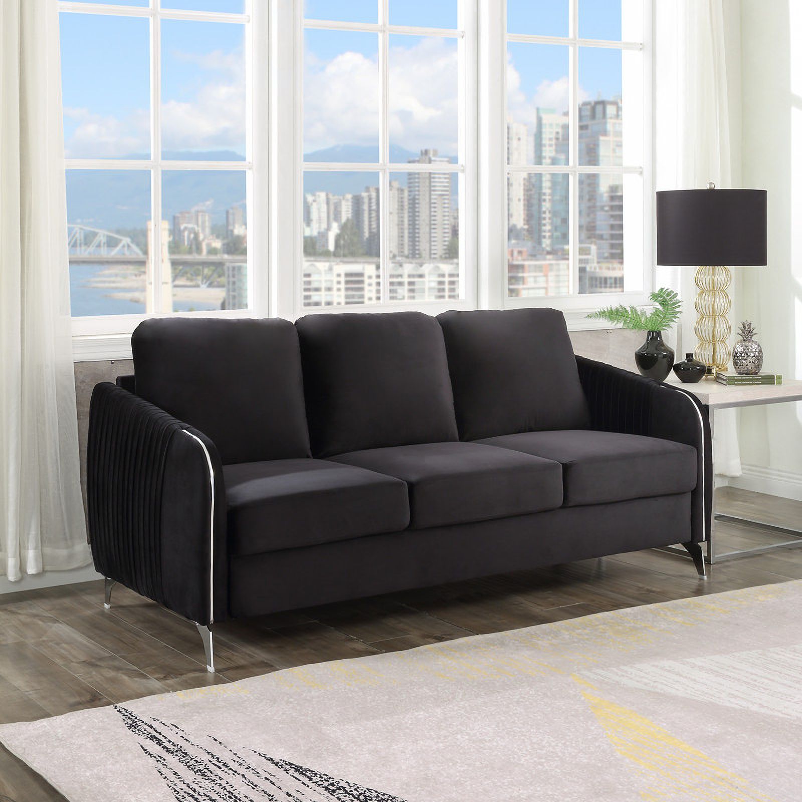 The appearance of Hathaway Black Velvet Modern Chic Sofa Couch designed by Lilola Home in the modern / contemporary interior design. This black piece of furniture was selected by 1StopBedrooms from Hathaway Collection to add a touch of cosiness and style into your home. Sku: 89726-S. Material: Velvet.