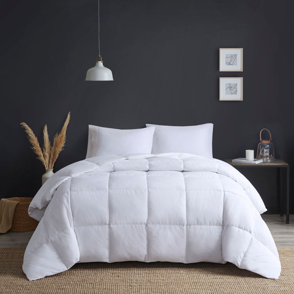 The appearance of Heavy Warmth Goose Feather and Down Oversize Twin/Twin XL Comforter In White designed by Olliix in the transitional interior design. This white piece of furniture was selected by 1StopBedrooms from Heavy Warmth Collection to add a touch of cosiness and style into your home. Sku: TN10-0488. Material: Microfiber. Bed Size: Twin.