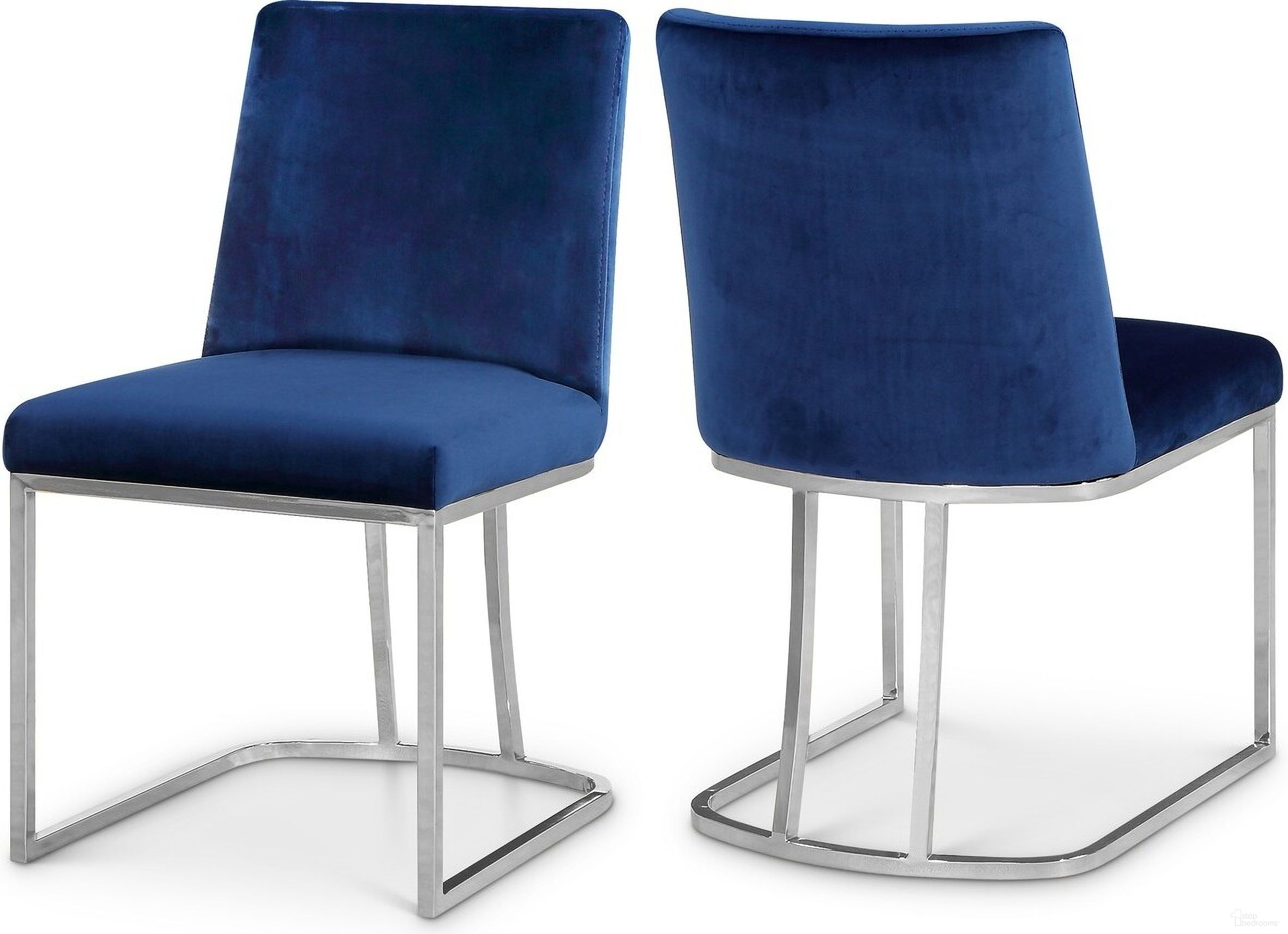 The appearance of Heidi Velvet Dining Chair Set of 2 In Navy and Chrome designed by Meridian in the modern / contemporary interior design. This navy piece of furniture was selected by 1StopBedrooms from Heidi Collection to add a touch of cosiness and style into your home. Sku: 728Navy-C. Material: Velvet. Chair Type: Side Chair.