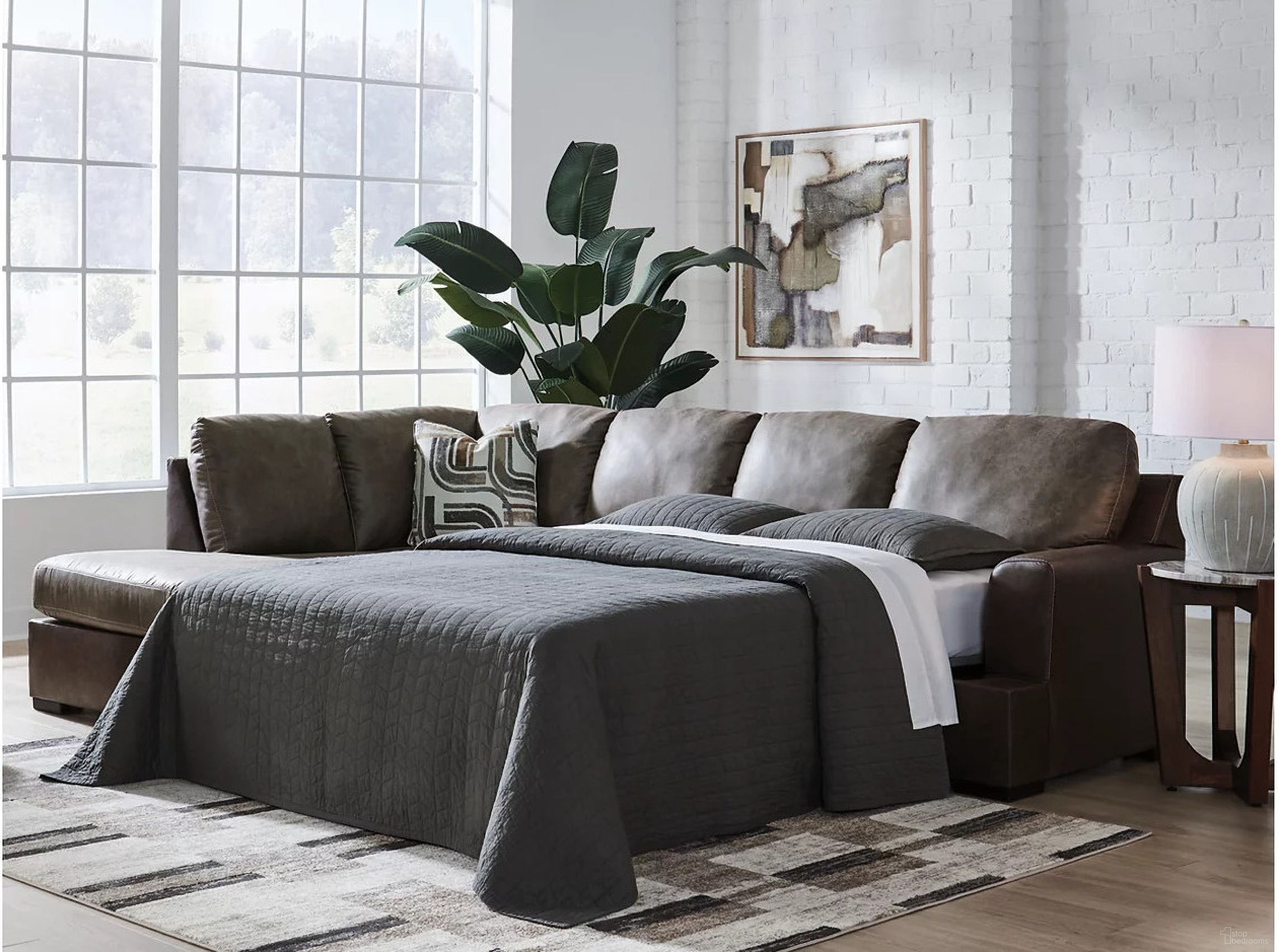 The appearance of Helson 2-Piece LAF Sleeper Sectional with Chaise In Fossil designed by Signature Design by Ashley in the modern / contemporary interior design. This fossil piece of furniture was selected by 1StopBedrooms from Helson Collection to add a touch of cosiness and style into your home. Sku: NC6270316;NC6270370. Material: Leather. Orientation: LAF.
