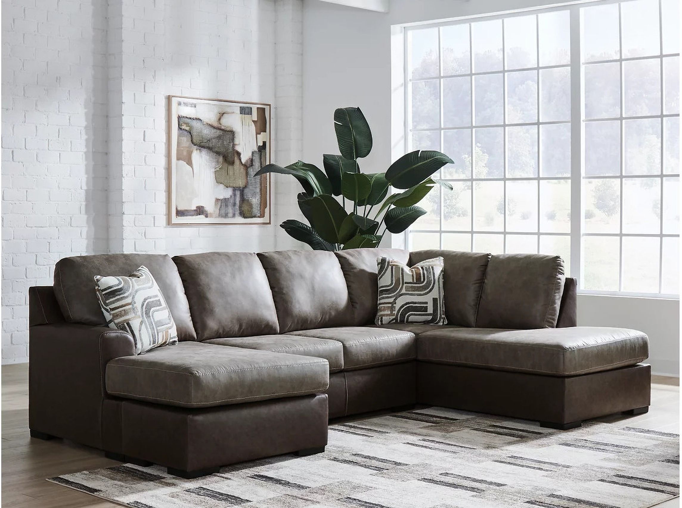 The appearance of Helson 2-Piece RAF Sectional with Chaise In Fossil designed by Signature Design by Ashley in the modern / contemporary interior design. This fossil piece of furniture was selected by 1StopBedrooms from Helson Collection to add a touch of cosiness and style into your home. Sku: NC6270302;NC6270317. Material: Leather. Orientation: RAF.