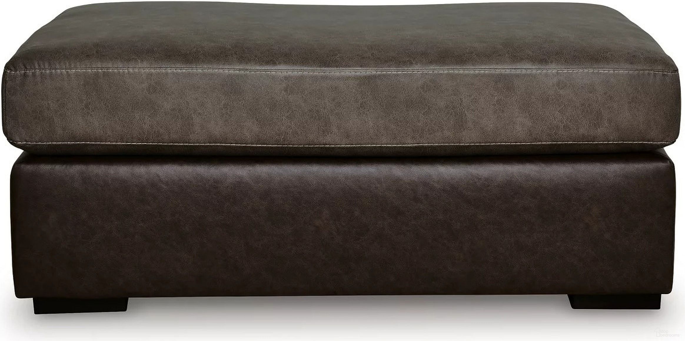 The appearance of Helson Oversized Accent Ottoman In Fossil designed by Signature Design by Ashley in the modern / contemporary interior design. This fossil piece of furniture  was selected by 1StopBedrooms from Helson Collection to add a touch of cosiness and style into your home. Sku: NC6270308. Material: Faux Leather.