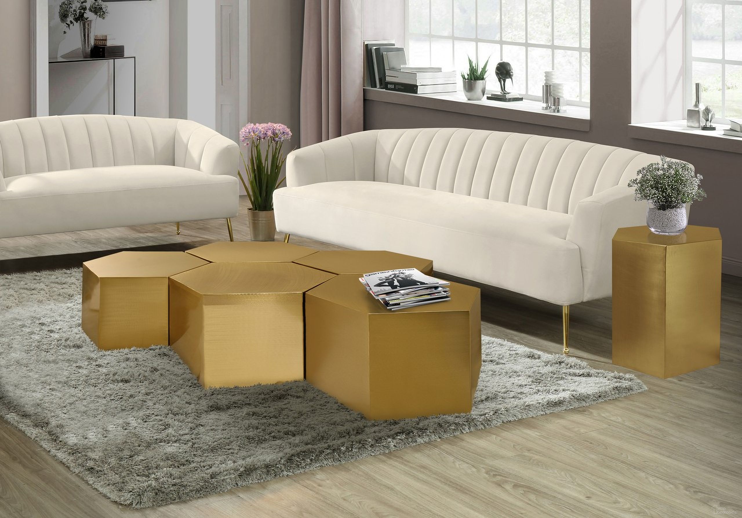 The appearance of Hexagon 5-Piece Occasional Table Set In Brushed Gold designed by Meridian in the modern / contemporary interior design. This brushed gold piece of furniture  was selected by 1StopBedrooms from Hexagon Collection to add a touch of cosiness and style into your home. Sku: 292-CT;292-CT;292-CT;292-CT;292-CT;292-ET. Material: Iron.