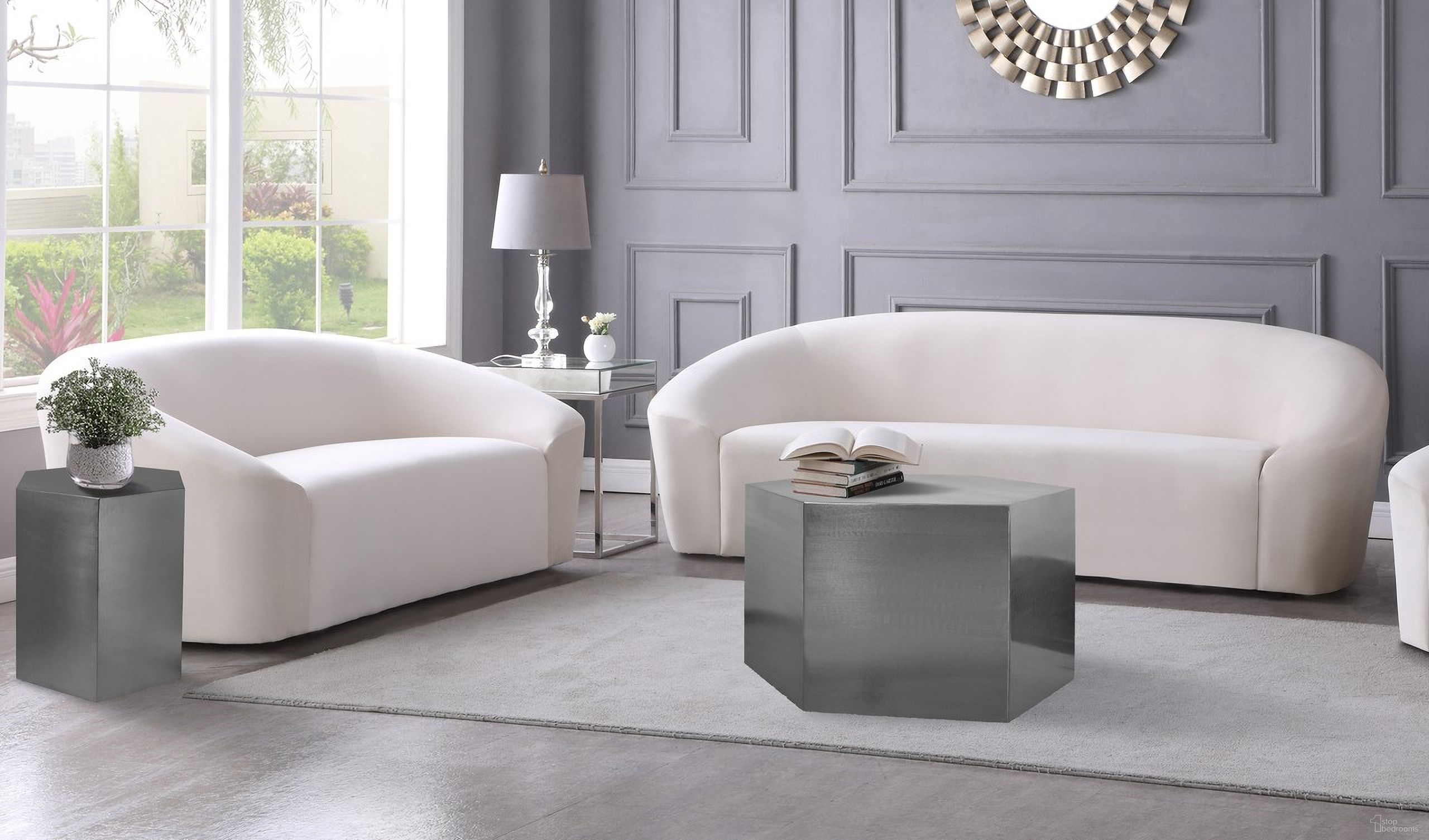 The appearance of Hexagon Ocassional Table Set In Chrome designed by Meridian in the modern / contemporary interior design. This chrome piece of furniture was selected by 1StopBedrooms from Hexagon Collection to add a touch of cosiness and style into your home. Sku: 293-CT;293-ET. Material: Iron.