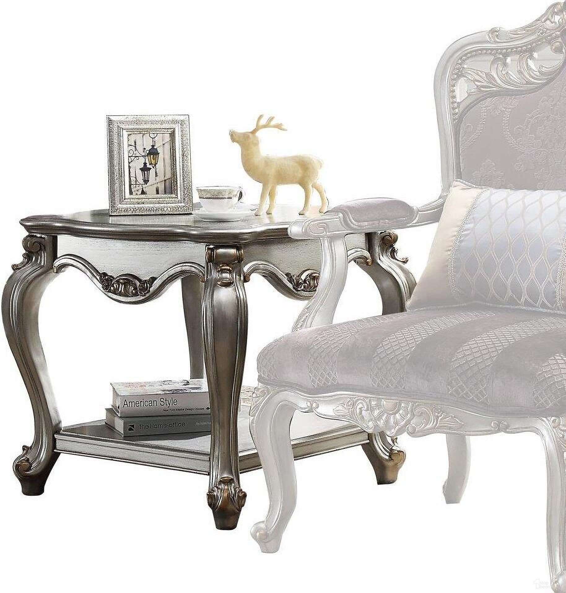 The appearance of Homeroots Antique Platinum Wood Poly Resin End Table designed by Homeroots in the traditional interior design. This grey piece of furniture  was selected by 1StopBedrooms from  to add a touch of cosiness and style into your home. Sku: 347446. Material: Wood.