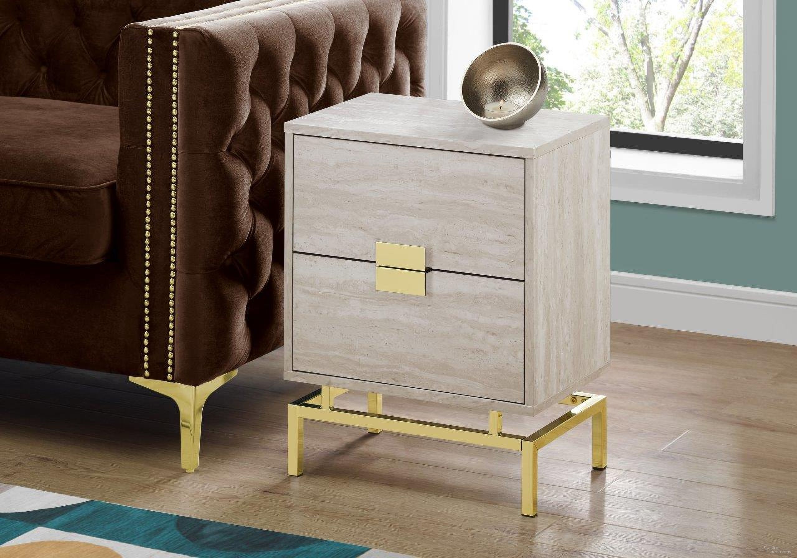 The appearance of Homeroots Beige Marble And Gold Metal Accent Table designed by Homeroots in the modern / contemporary interior design. This golden beige piece of furniture  was selected by 1StopBedrooms from  to add a touch of cosiness and style into your home. Sku: 333236. Material: MDF.