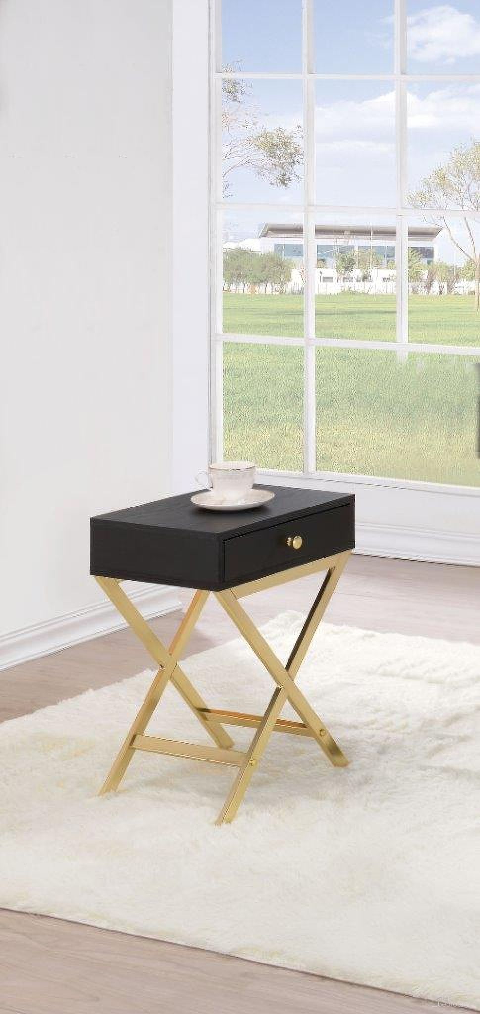 The appearance of Homeroots Black And Brass Side Table designed by Homeroots in the traditional interior design. This black piece of furniture  was selected by 1StopBedrooms from  to add a touch of cosiness and style into your home. Sku: 286067. Material: Vinyl.