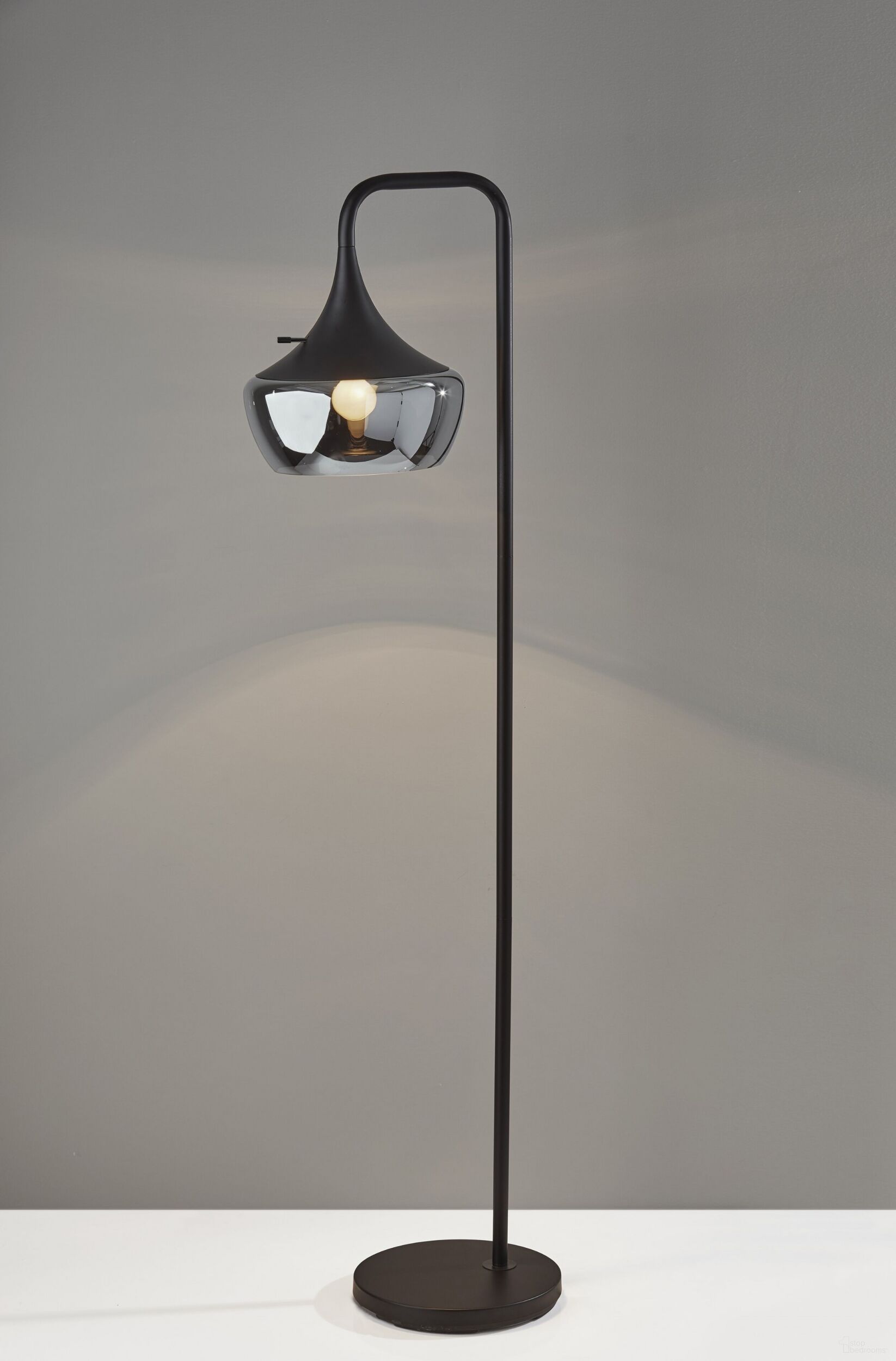 The appearance of Homeroots Black Metal Floor Lamp 372856 designed by Homeroots in the modern / contemporary interior design. This black piece of furniture  was selected by 1StopBedrooms from  to add a touch of cosiness and style into your home. Sku: 372856. Material: Metal.