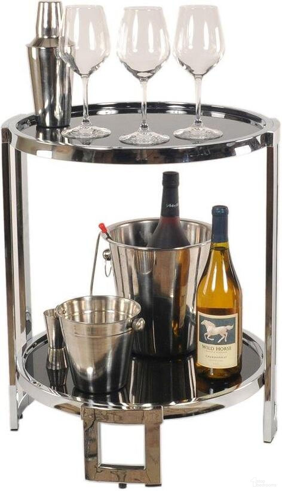 The appearance of Homeroots Chrome Round End Table designed by Homeroots in the modern / contemporary interior design. This chrome piece of furniture  was selected by 1StopBedrooms from  to add a touch of cosiness and style into your home. Sku: 364167. Material: Chrome.