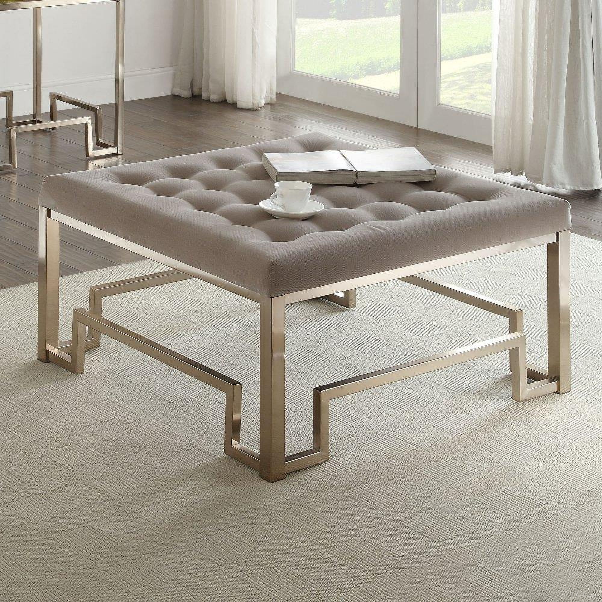 The appearance of Homeroots Fabric And Champagne Cocktail Ottoman designed by Homeroots in the modern / contemporary interior design. This champagne piece of furniture was selected by 1StopBedrooms from to add a touch of cosiness and style into your home. Sku: 286055. Material: Fabric.