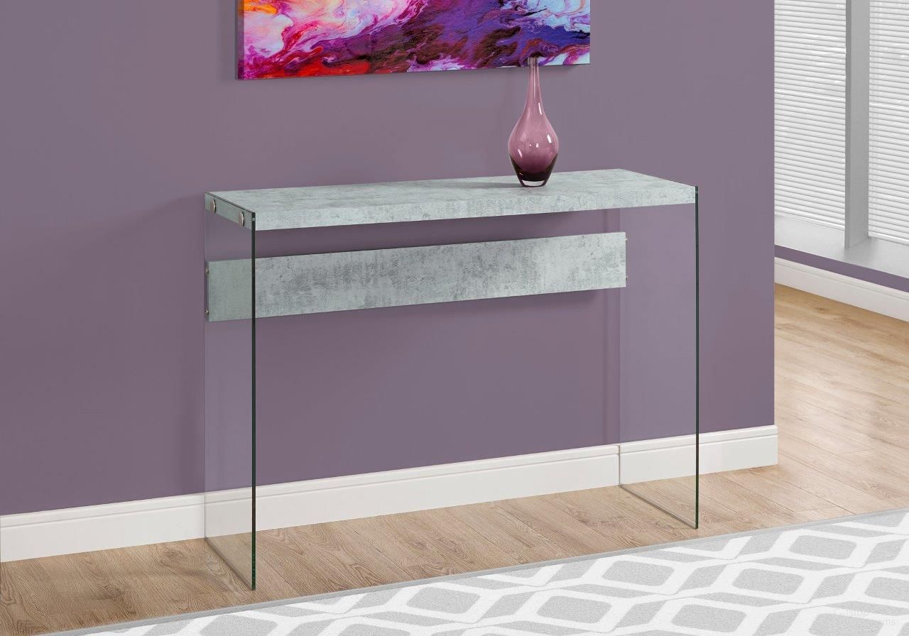 The appearance of Homeroots Grey Cement And Clear Tempered Glass Accent Table designed by Homeroots in the modern / contemporary interior design. This grey piece of furniture was selected by 1StopBedrooms from to add a touch of cosiness and style into your home. Sku: 333109. Material: Glass.